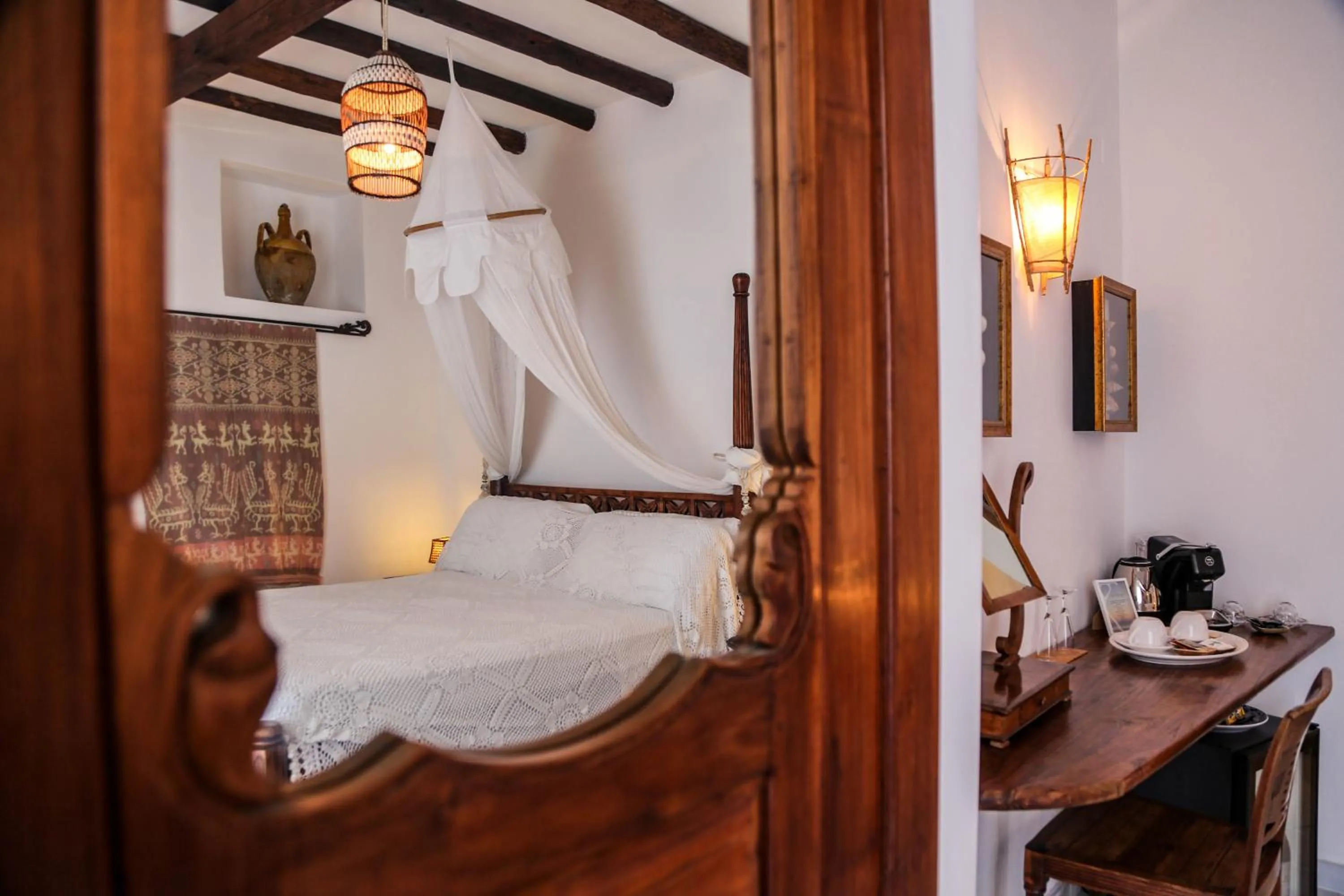 Bed in Quartara Boutique Hotel