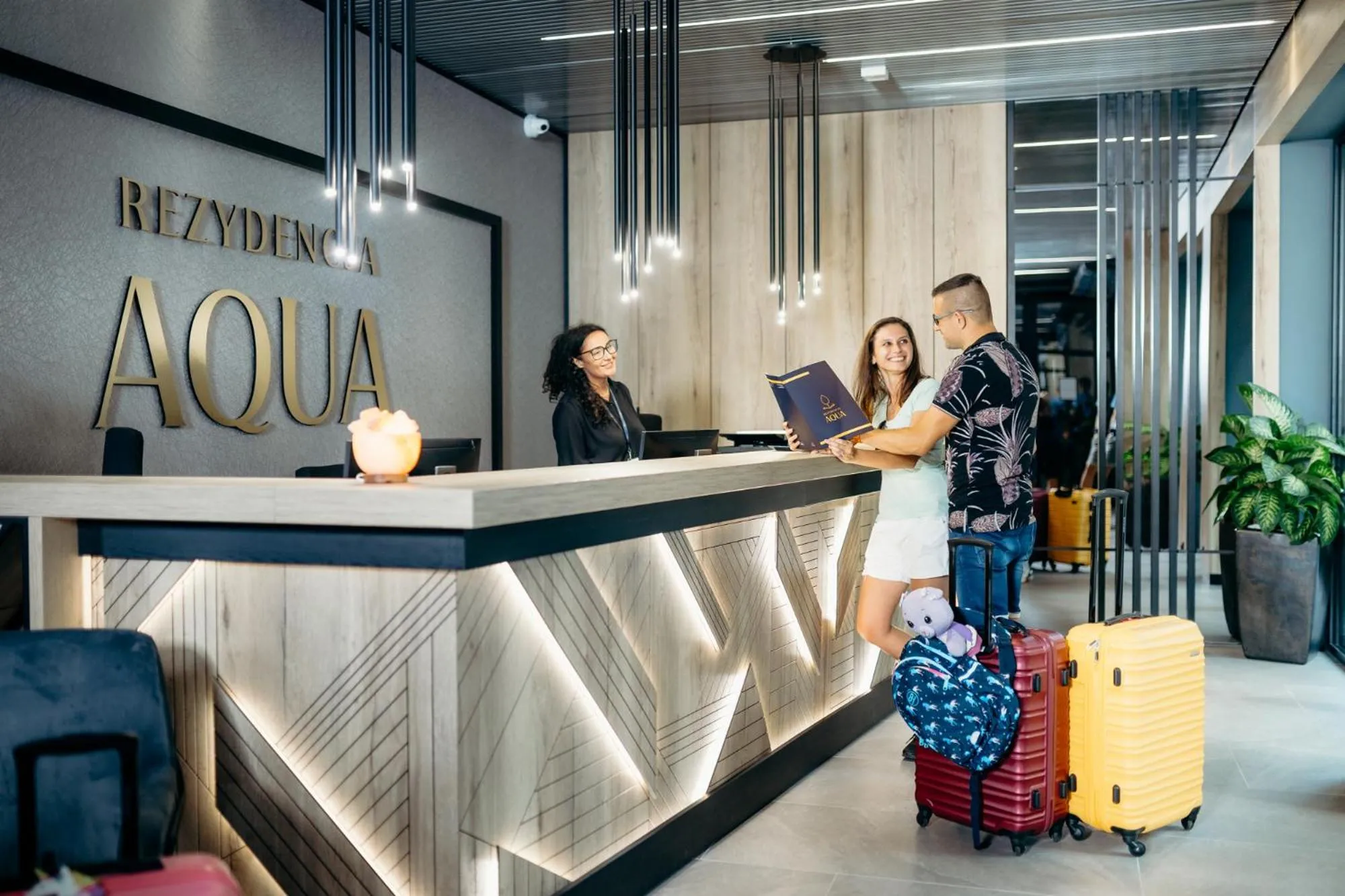 Lobby or reception in Rezydencja AQUA by GRANO