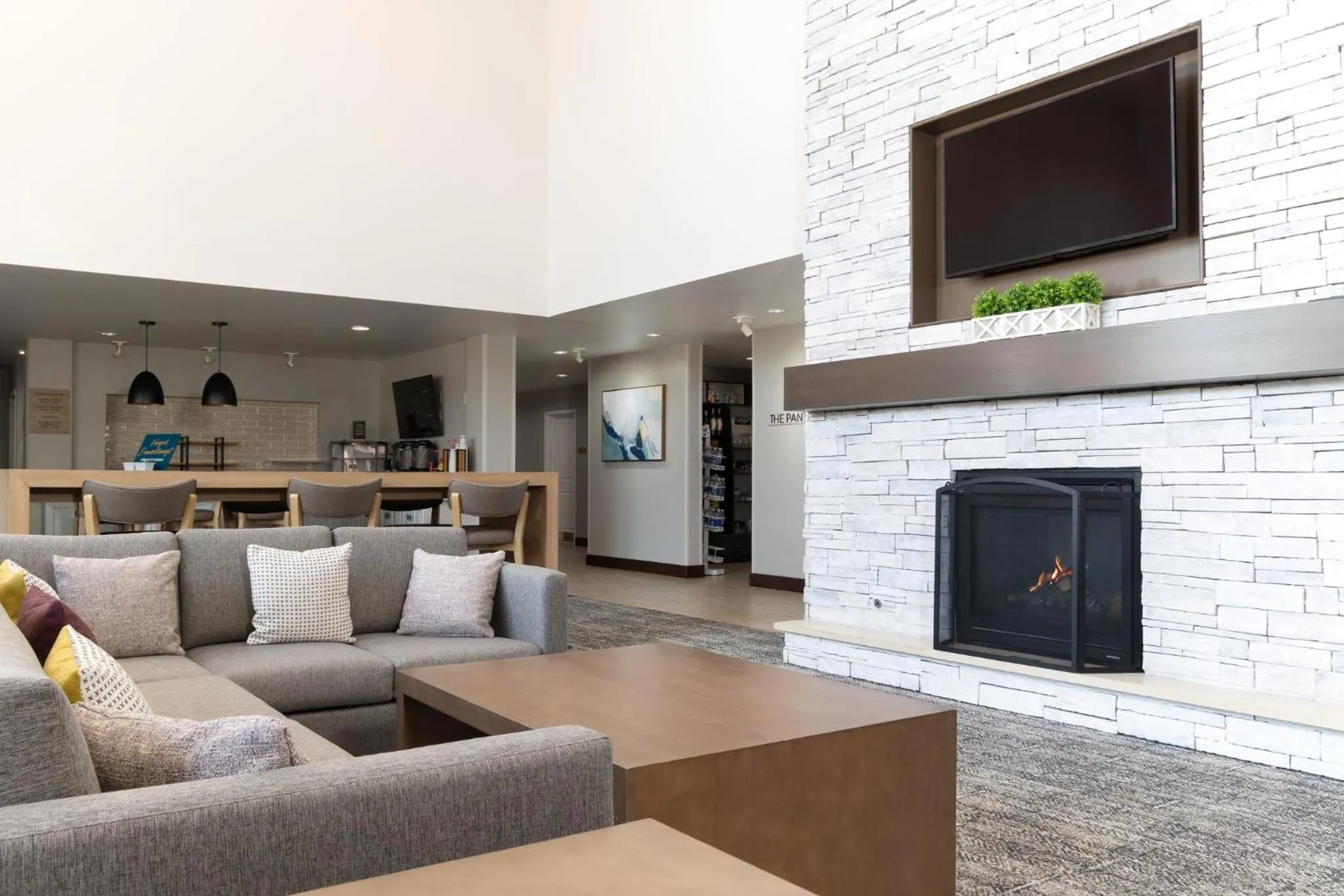 Communal lounge/ TV room in Staybridge Suites Denver - Central Park by IHG