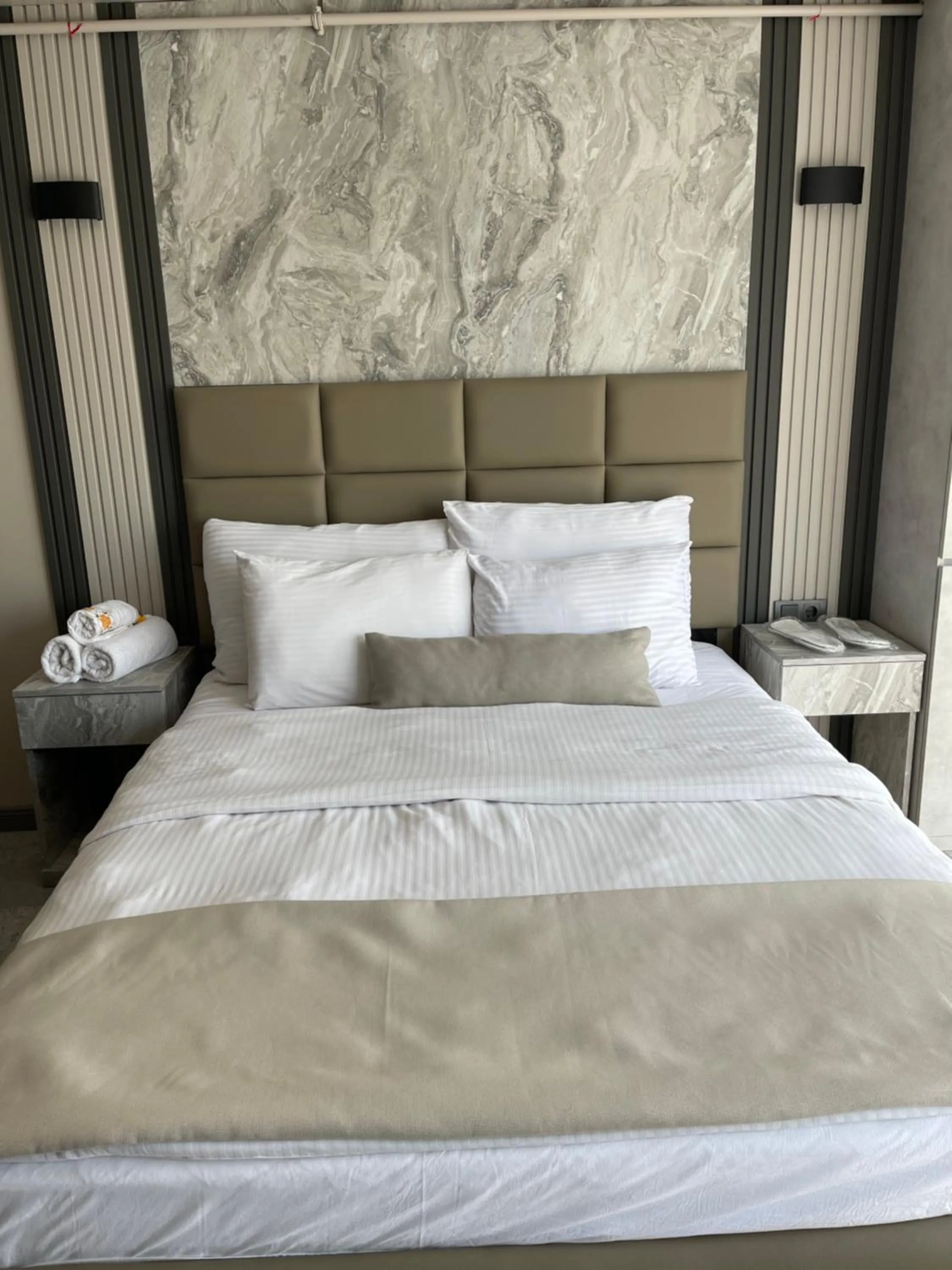 Bed in Aymira Suite Hotel