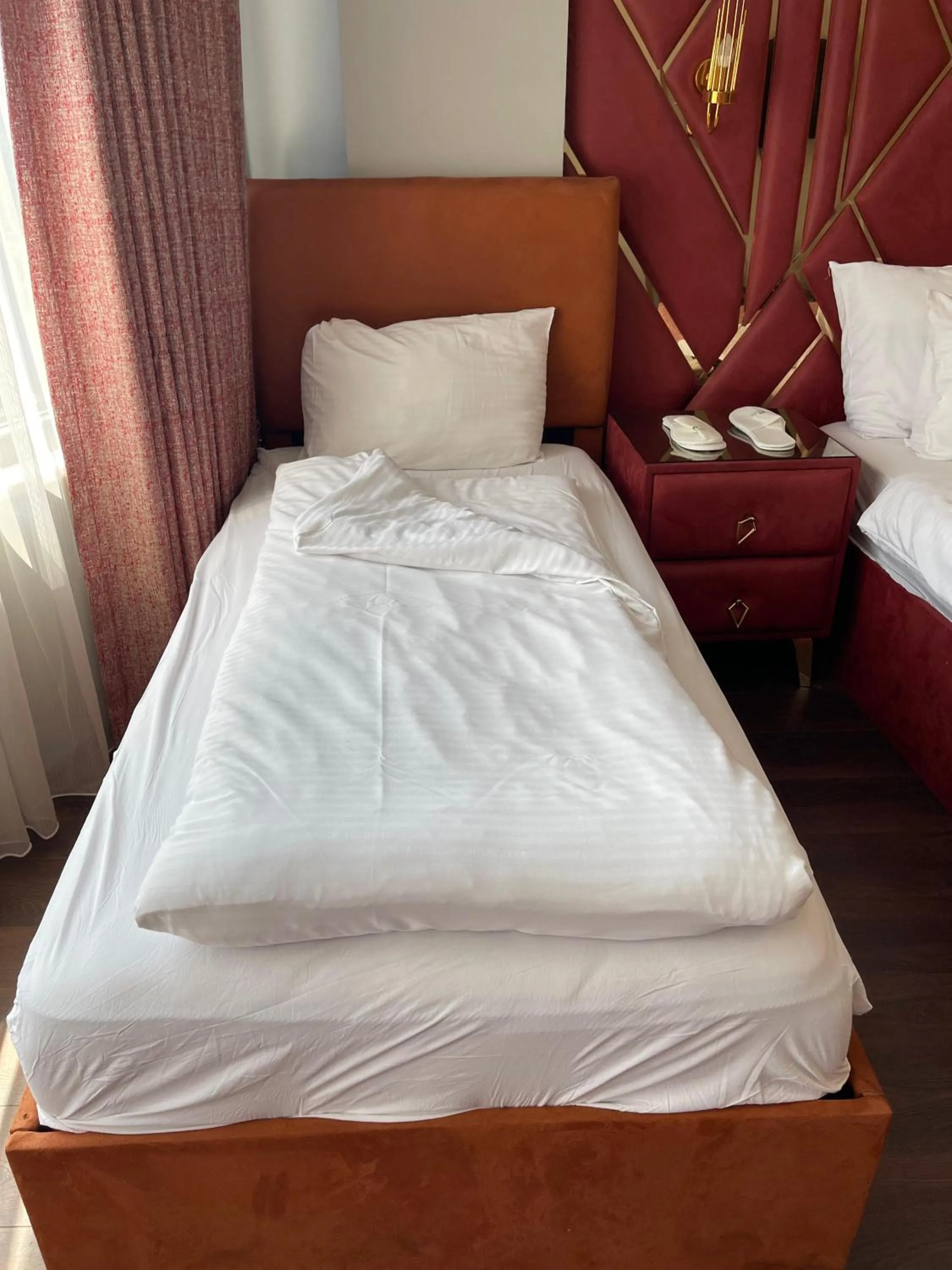 Bed in Aymira Suite Hotel