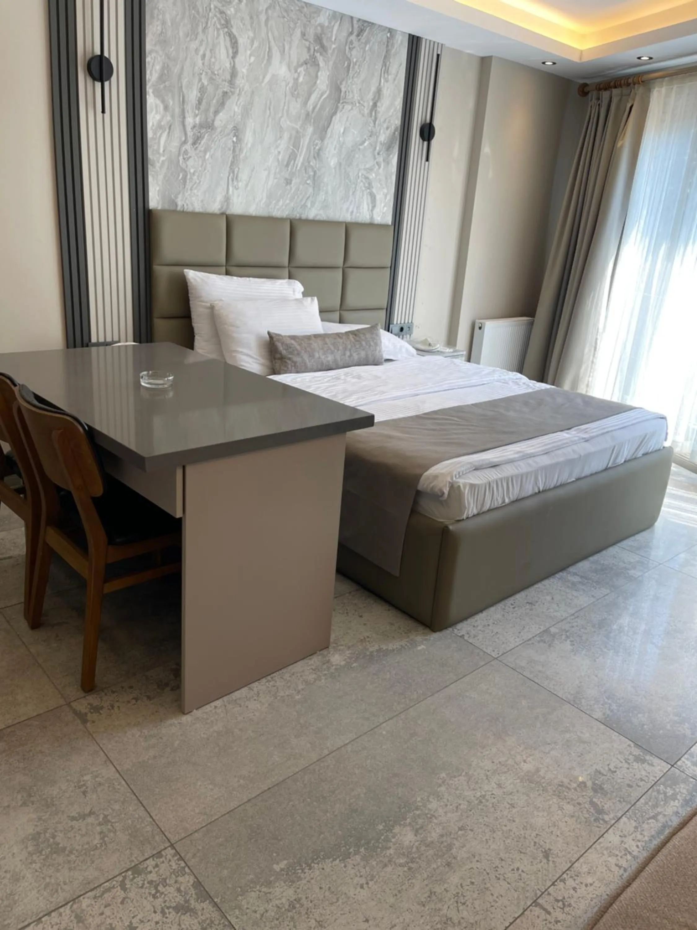 Bed in Aymira Suite Hotel