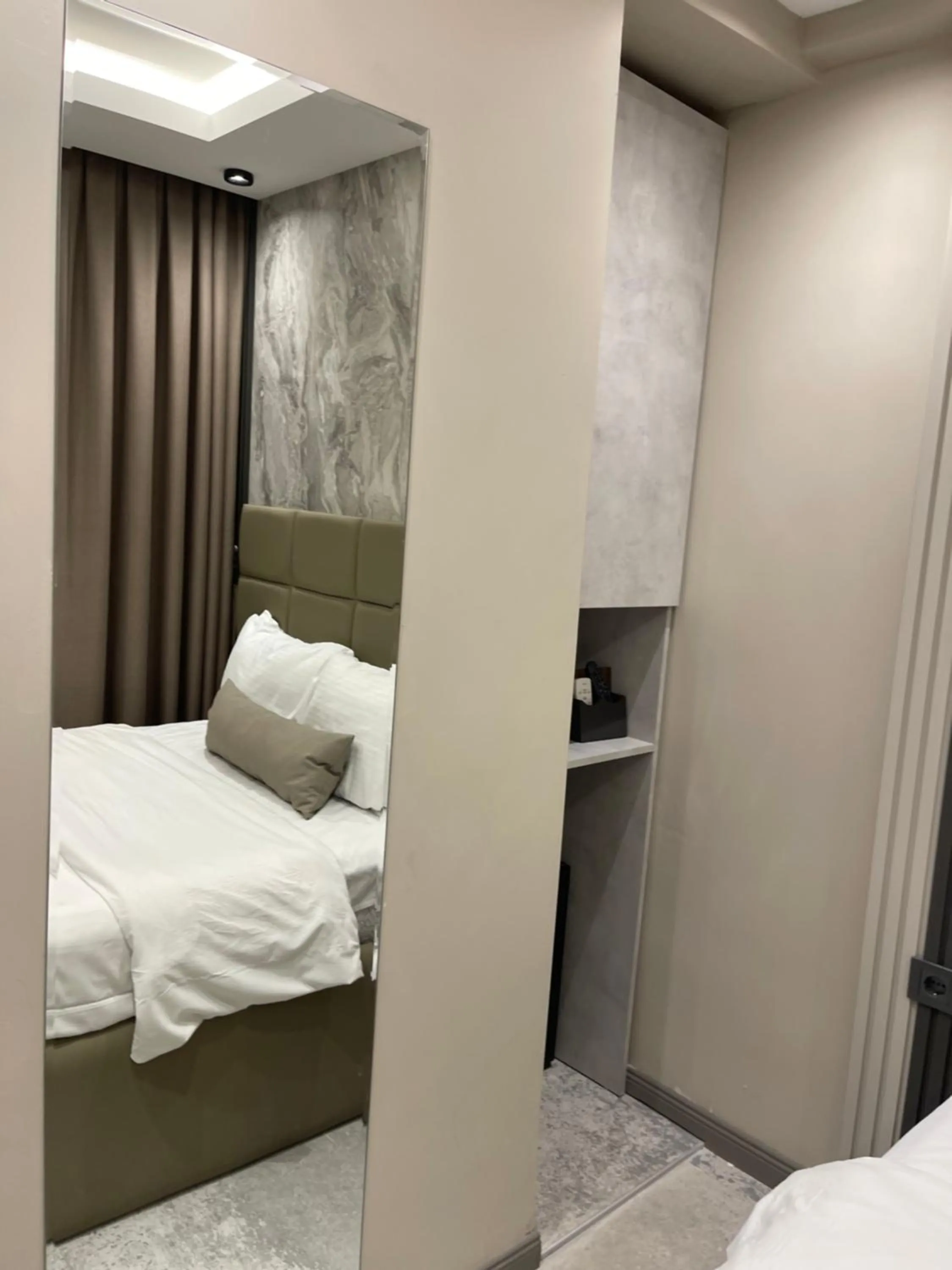 Bed in Aymira Suite Hotel