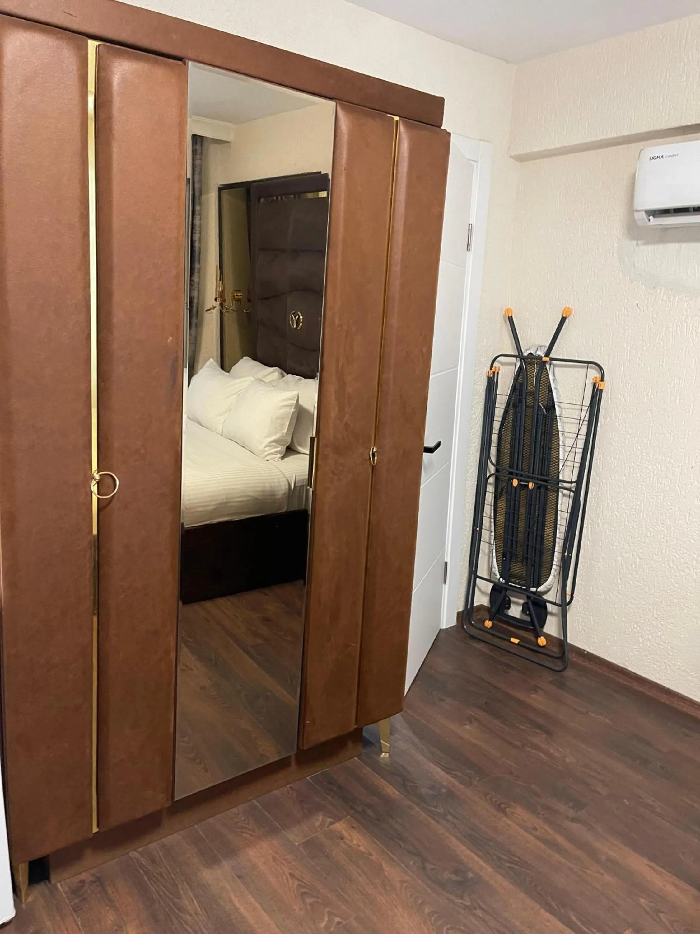 Bed in Aymira Suite Hotel