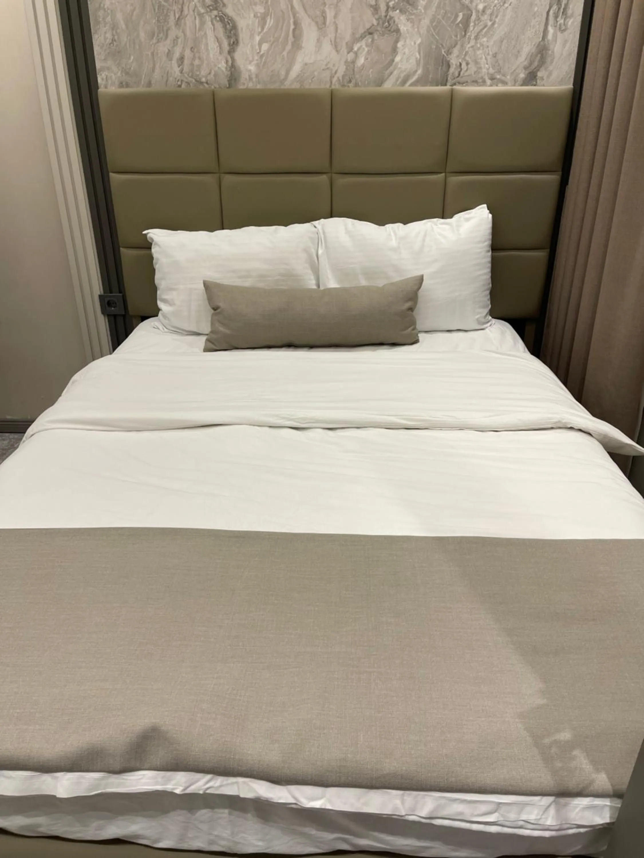 Bed in Aymira Suite Hotel