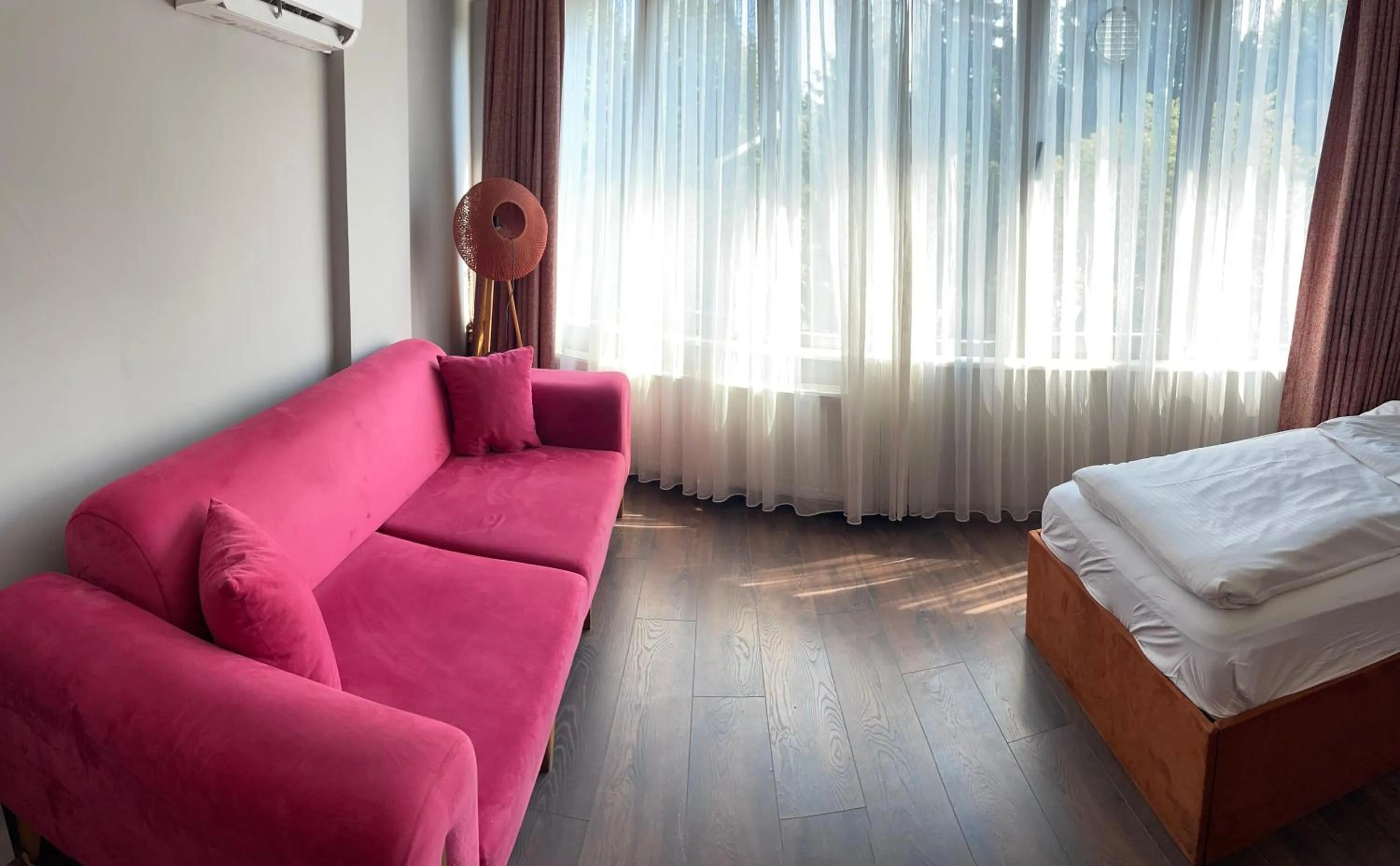 Bed in Aymira Suite Hotel