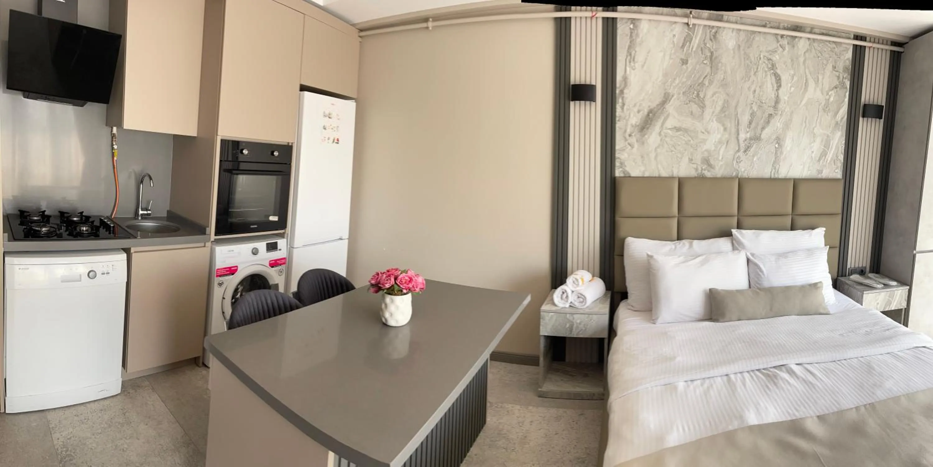 Bed in Aymira Suite Hotel