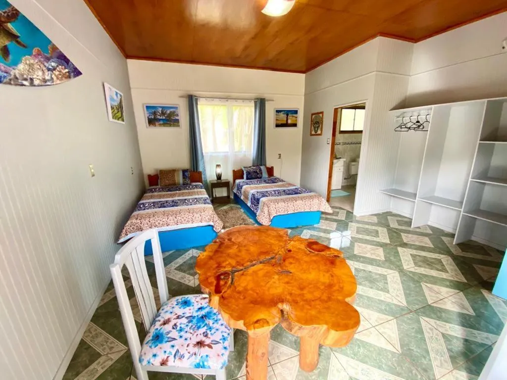 Photo of the whole room, Bed in Kahina Lodge