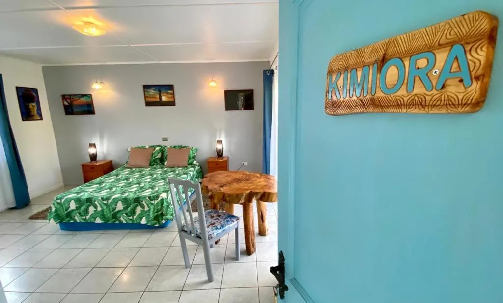Property logo or sign, Bed in Kahina Lodge