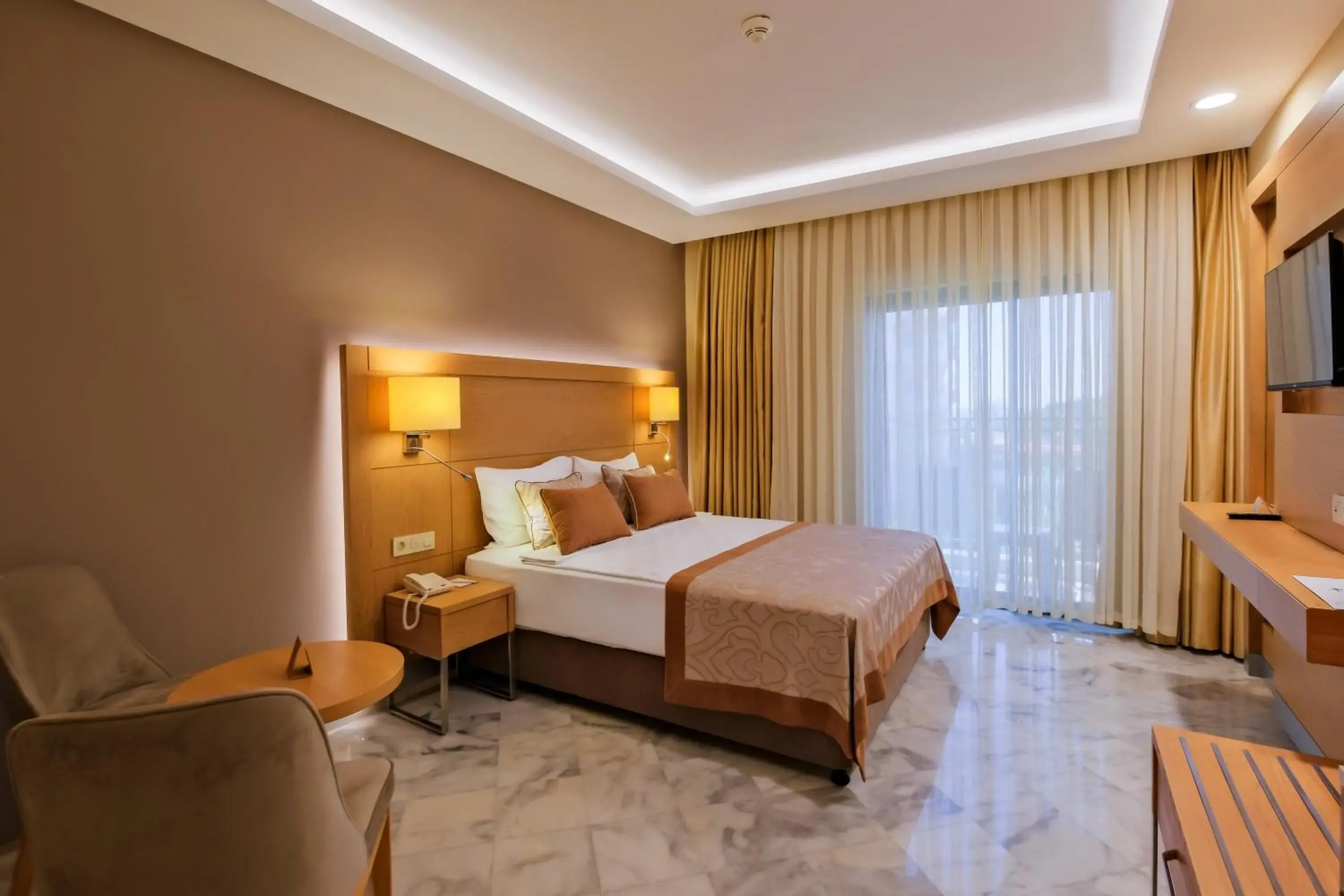 Bed in Belconti Resort Hotel Bed in Belconti Resort Hotel