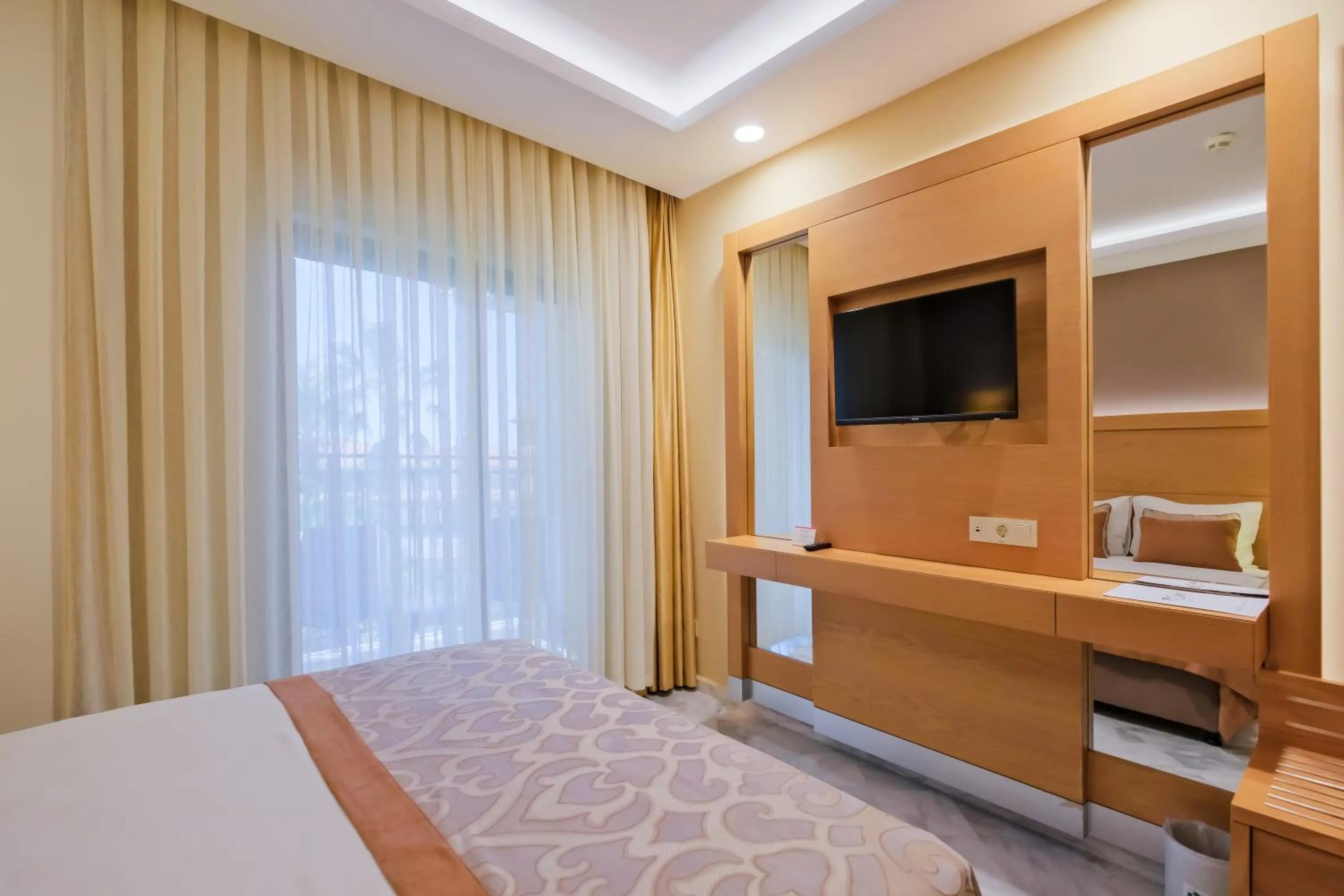 TV and multimedia, Bed in Belconti Resort Hotel