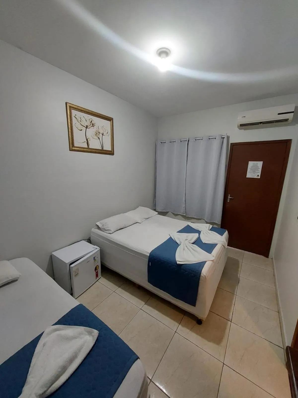 Bed in Pousada Itaguaçu
