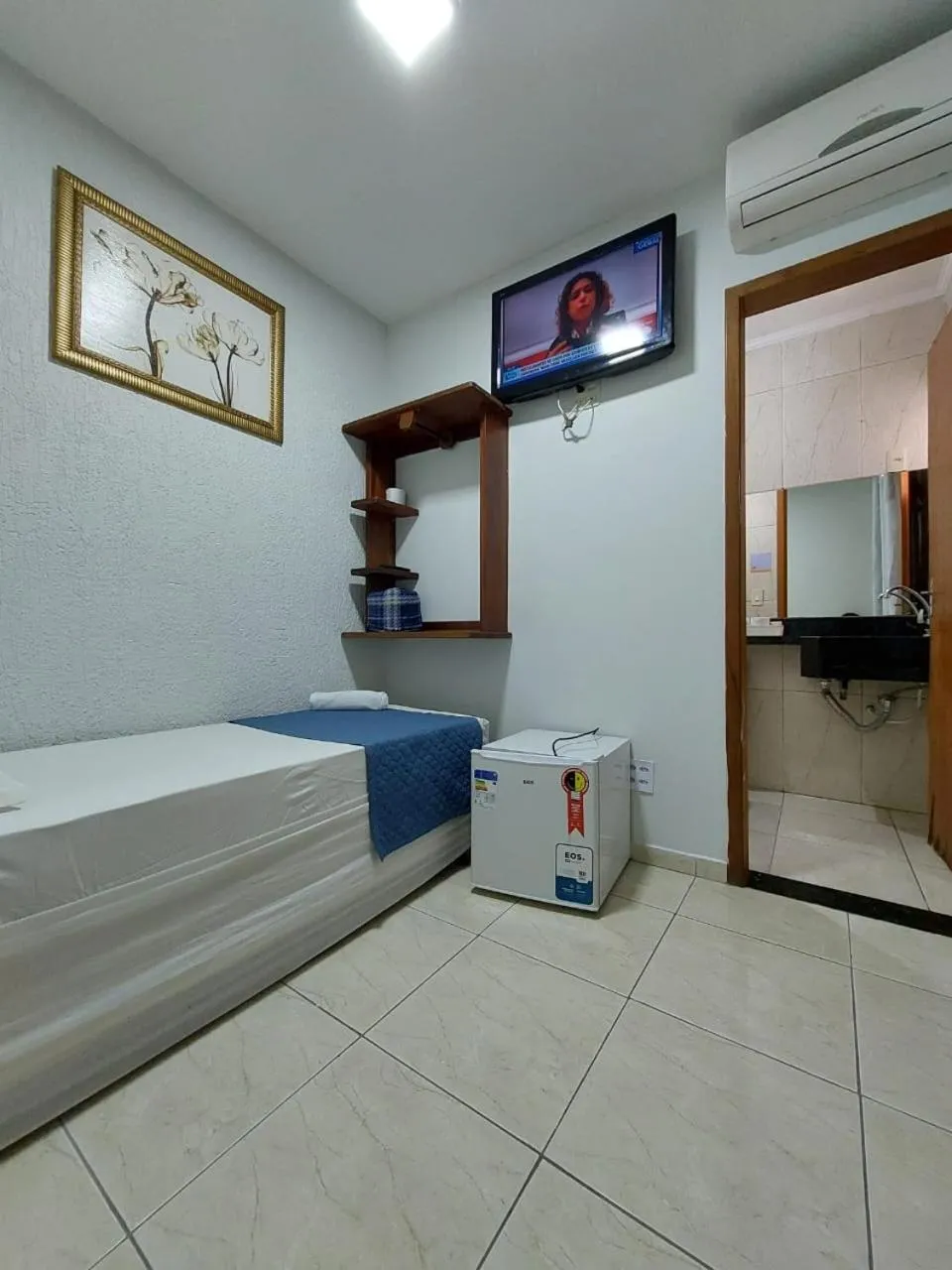 Bed in Pousada Itaguaçu