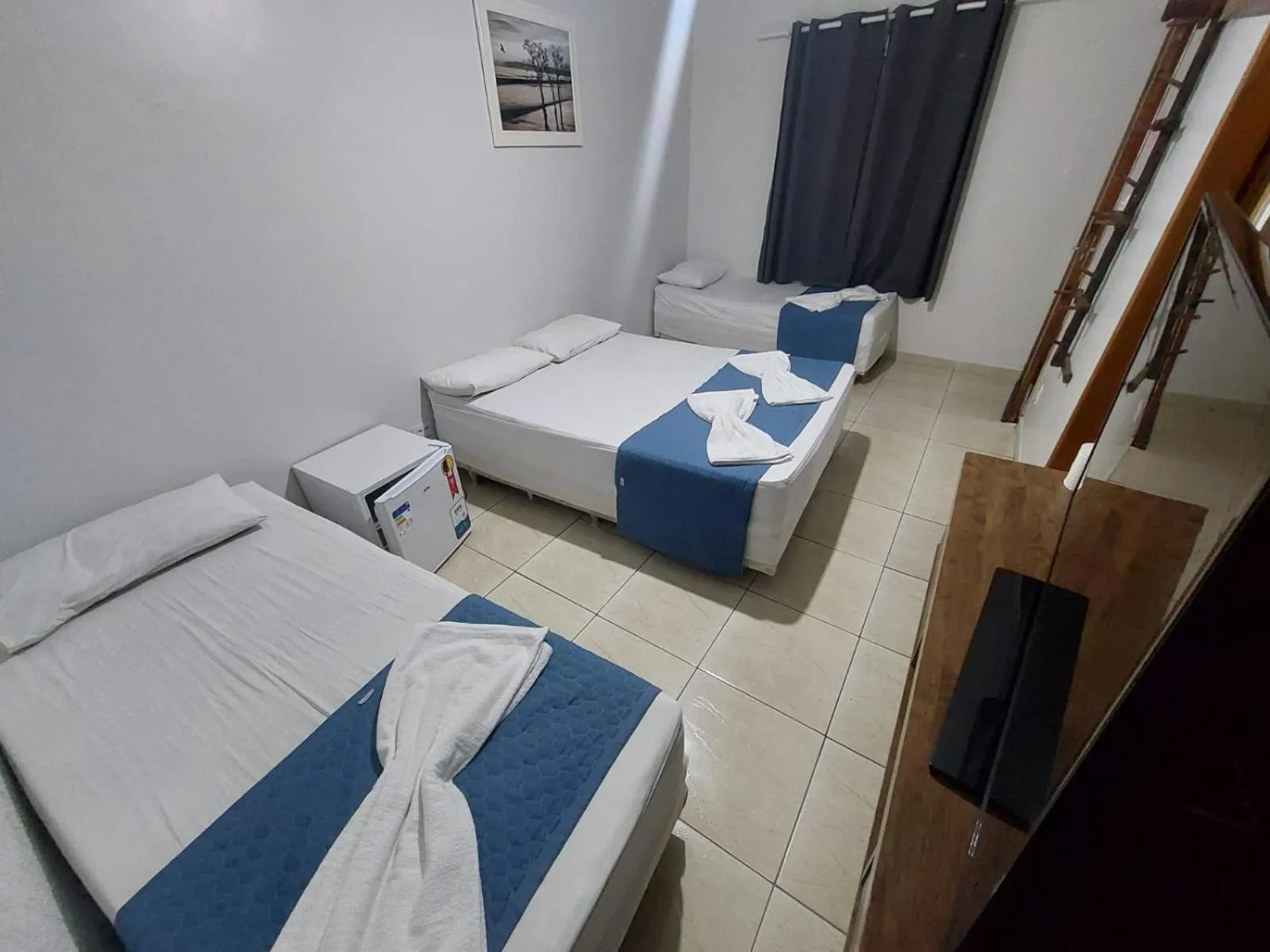 Bed in Pousada Itaguaçu