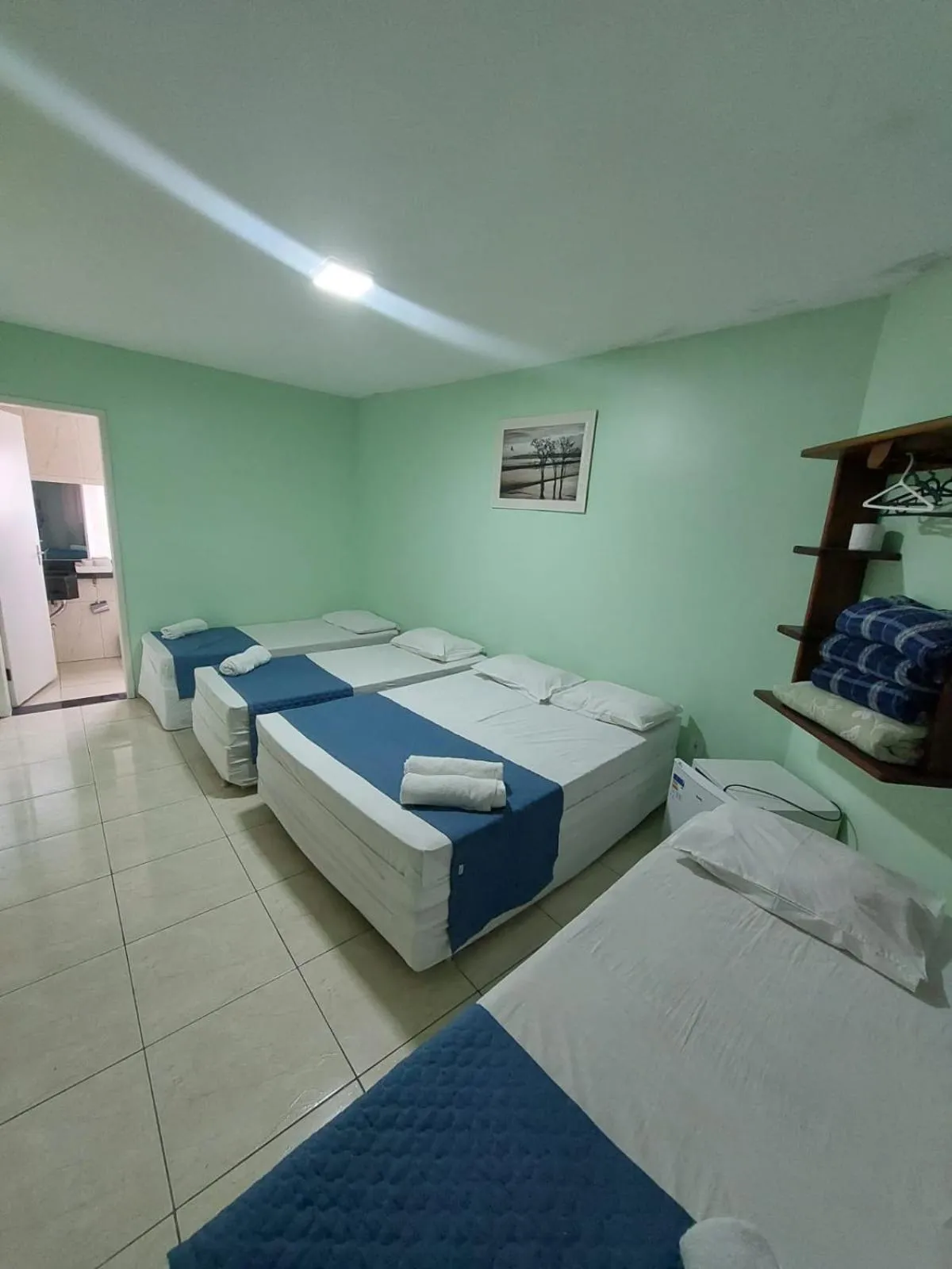 Bed in Pousada Itaguaçu
