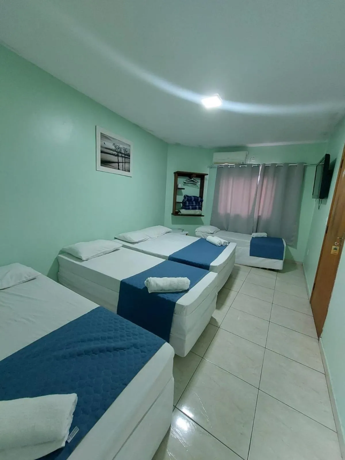 Bed in Pousada Itaguaçu