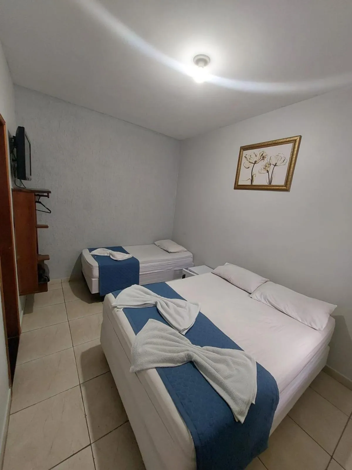 Bed in Pousada Itaguaçu