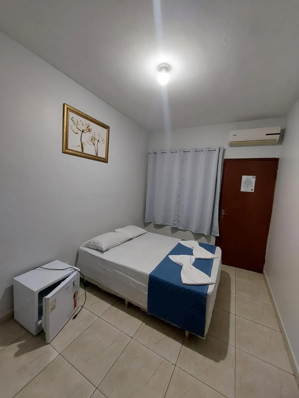 Bed in Pousada Itaguaçu