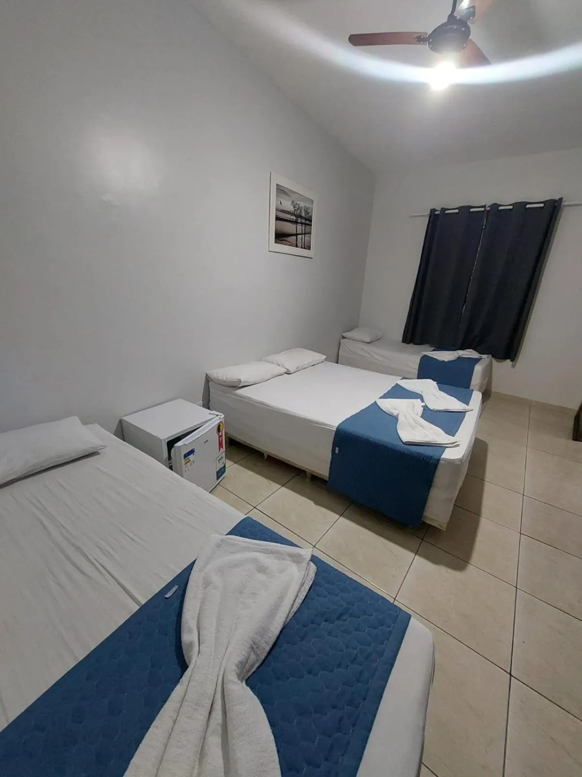 Bed in Pousada Itaguaçu