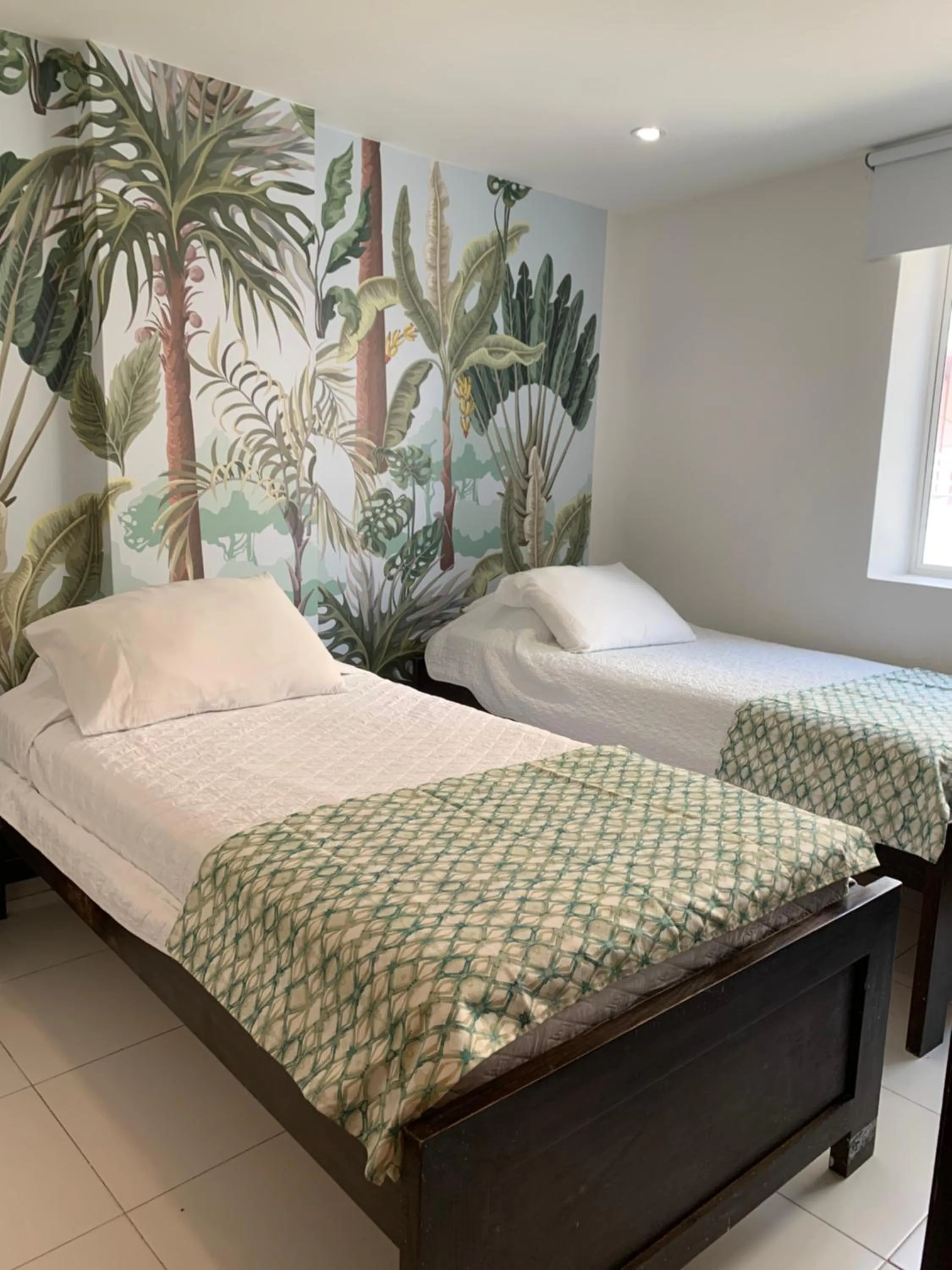 Bed in Tropical Breeze Apartamentos