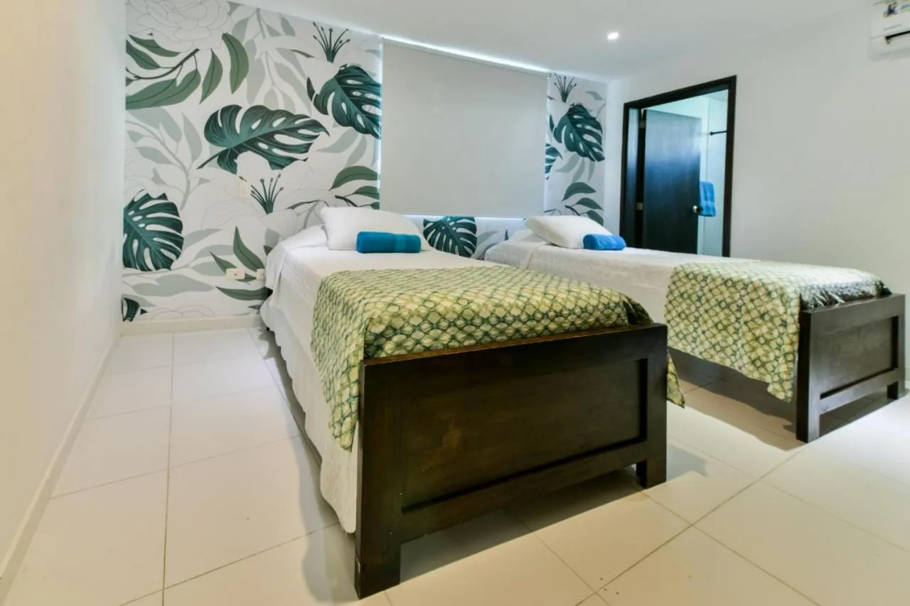 Bed in Tropical Breeze Apartamentos