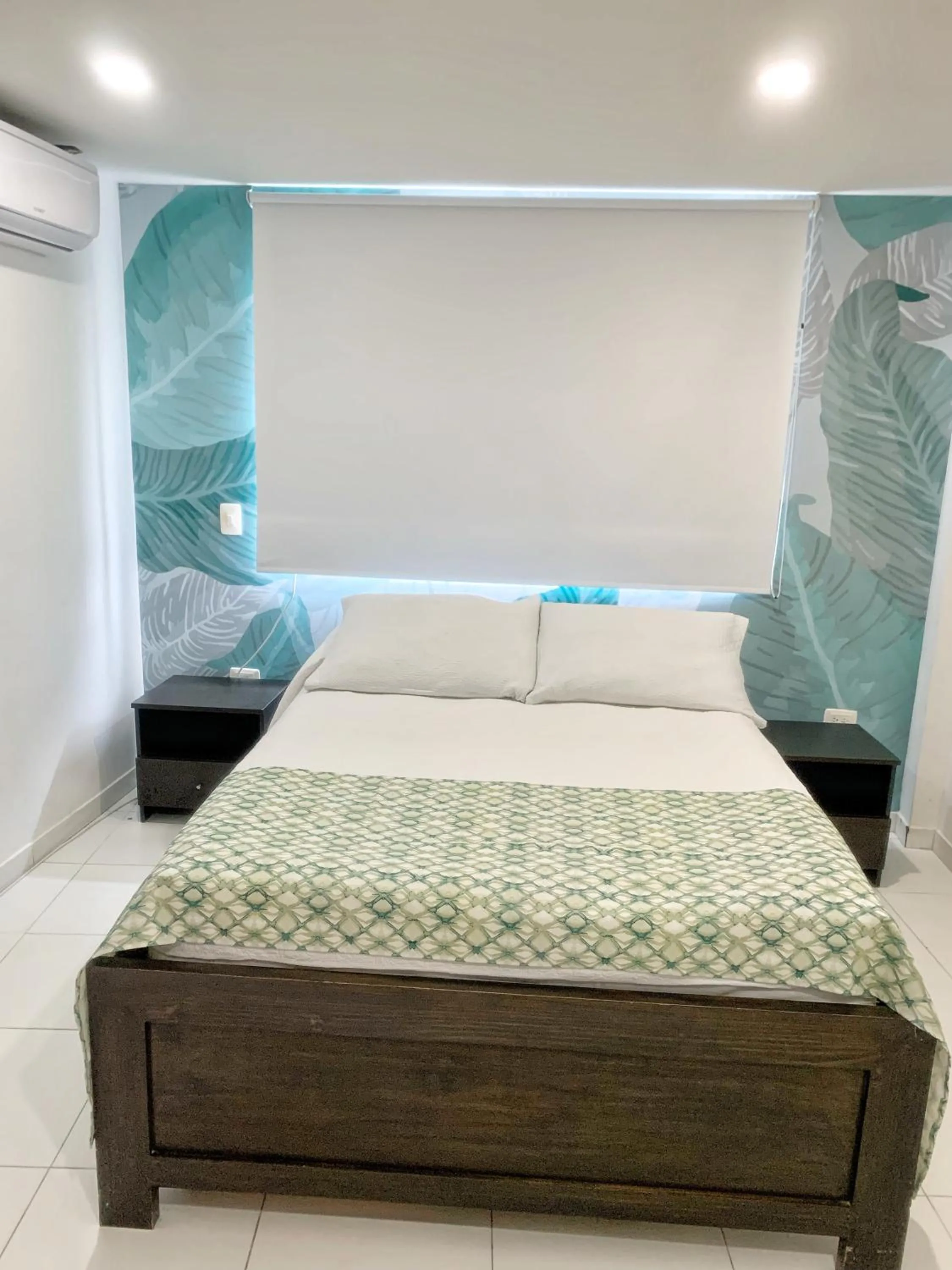 Bed in Tropical Breeze Apartamentos
