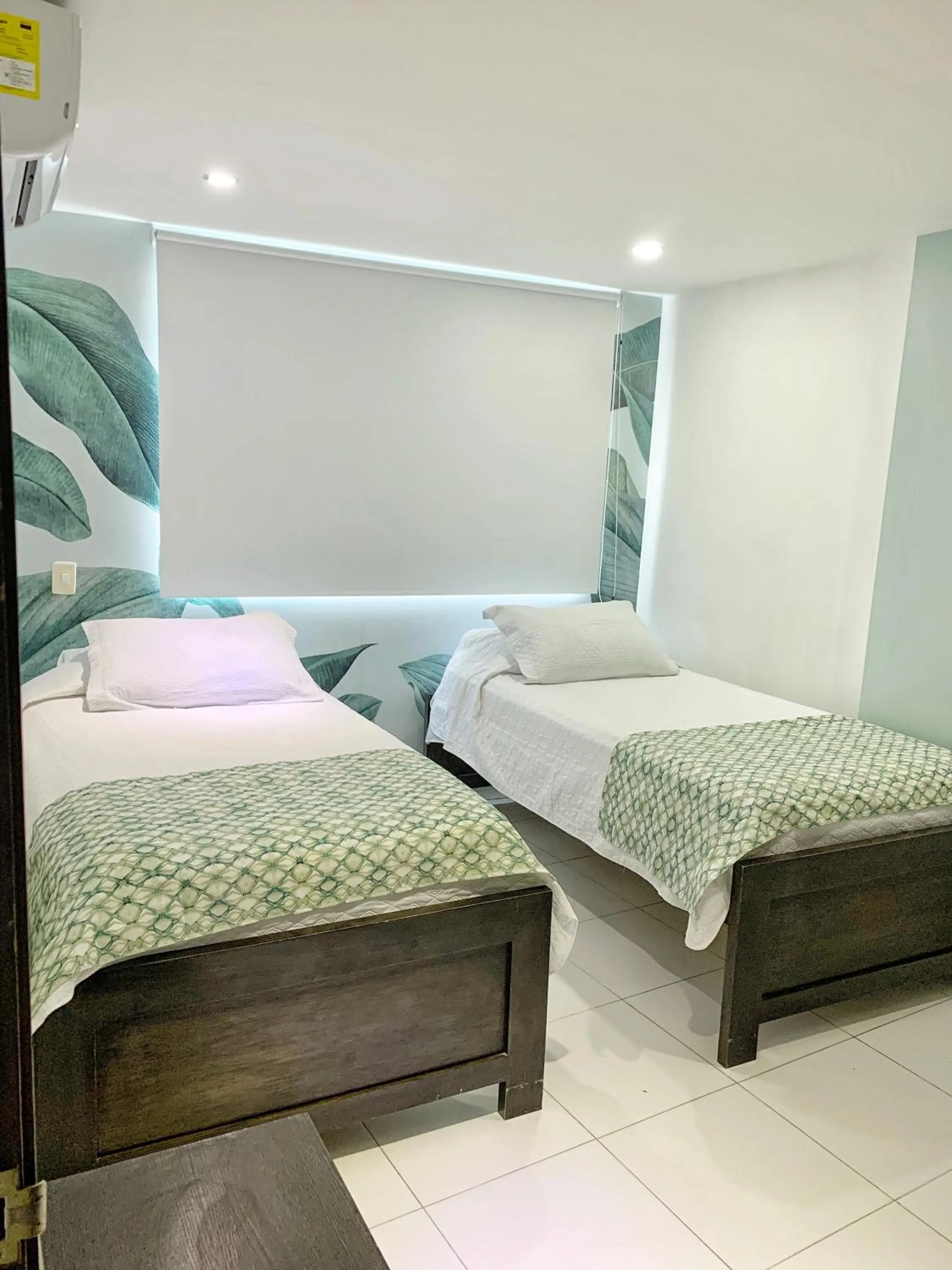 Bed in Tropical Breeze Apartamentos