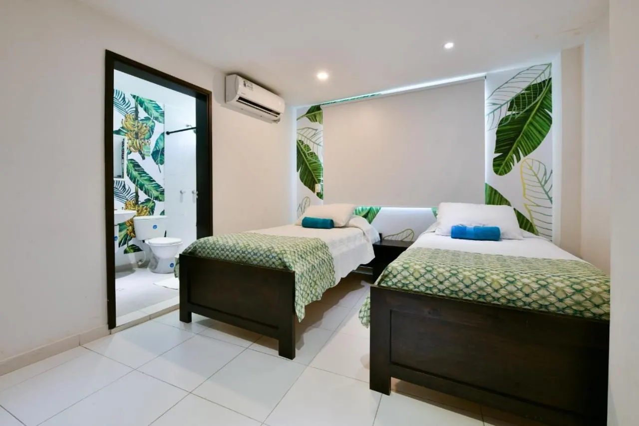Bed in Tropical Breeze Apartamentos