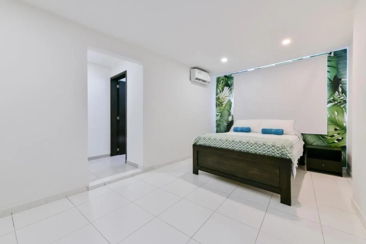 Bed in Tropical Breeze Apartamentos
