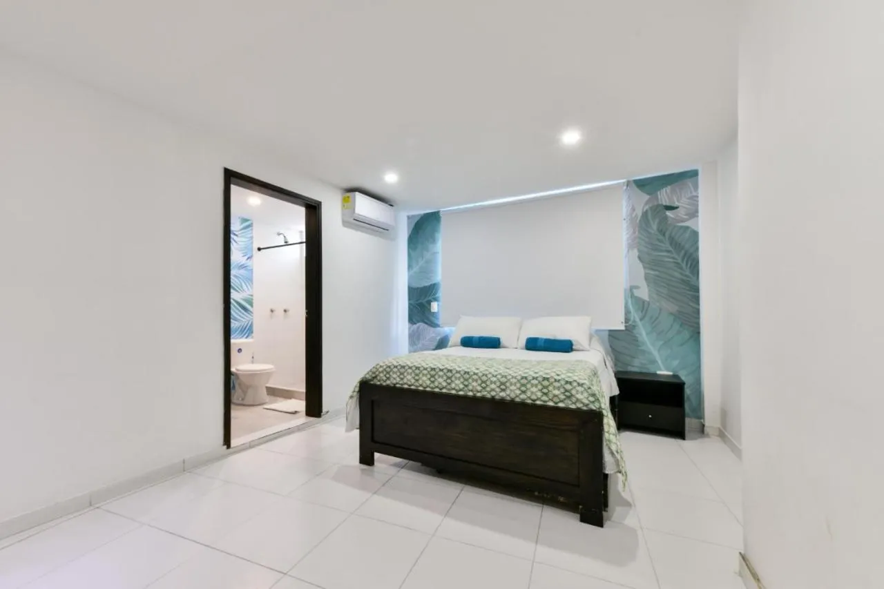 Bed in Tropical Breeze Apartamentos