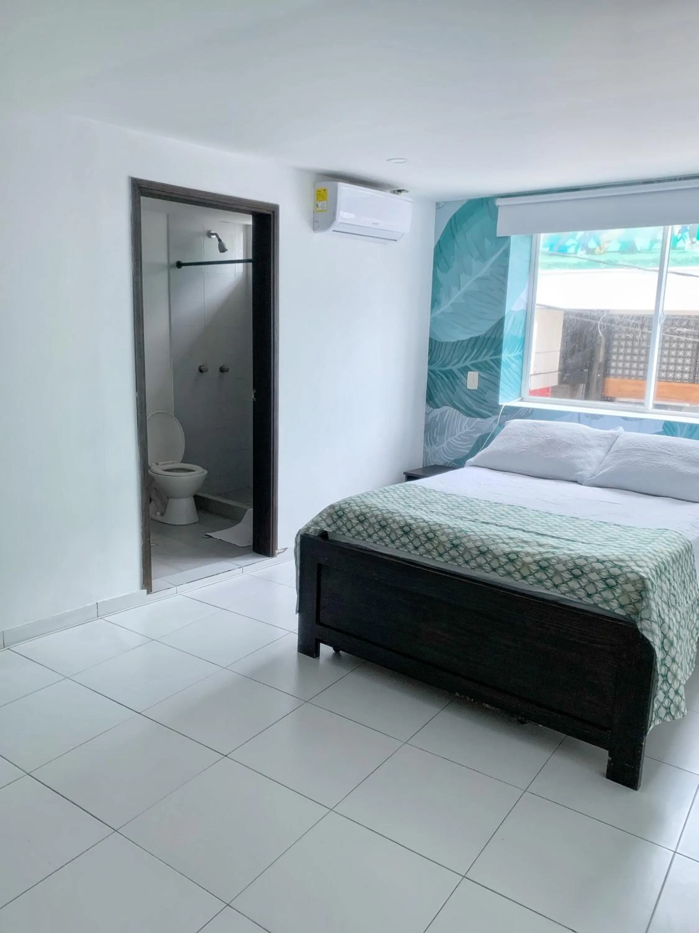Bed in Tropical Breeze Apartamentos