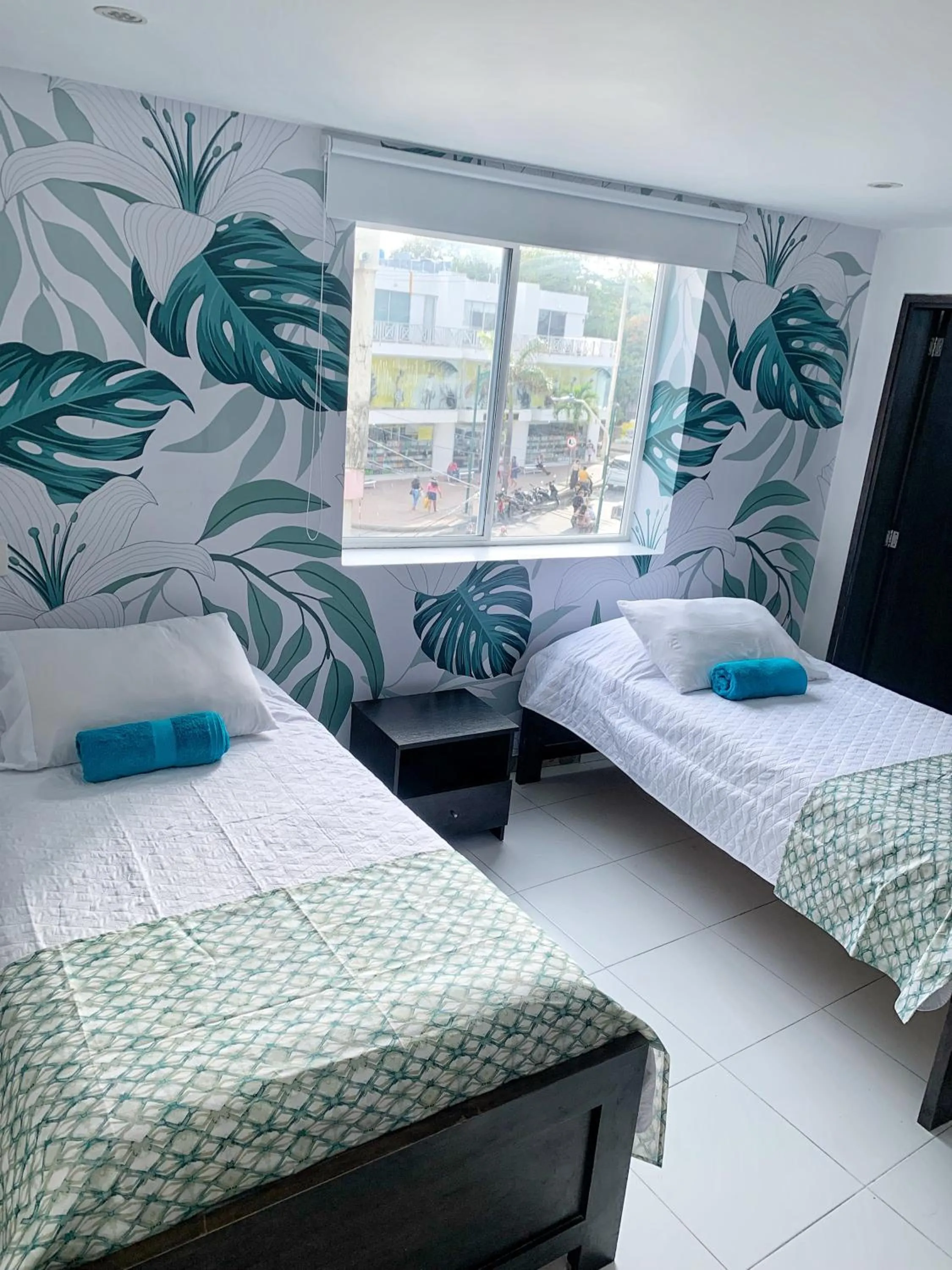 Bed in Tropical Breeze Apartamentos