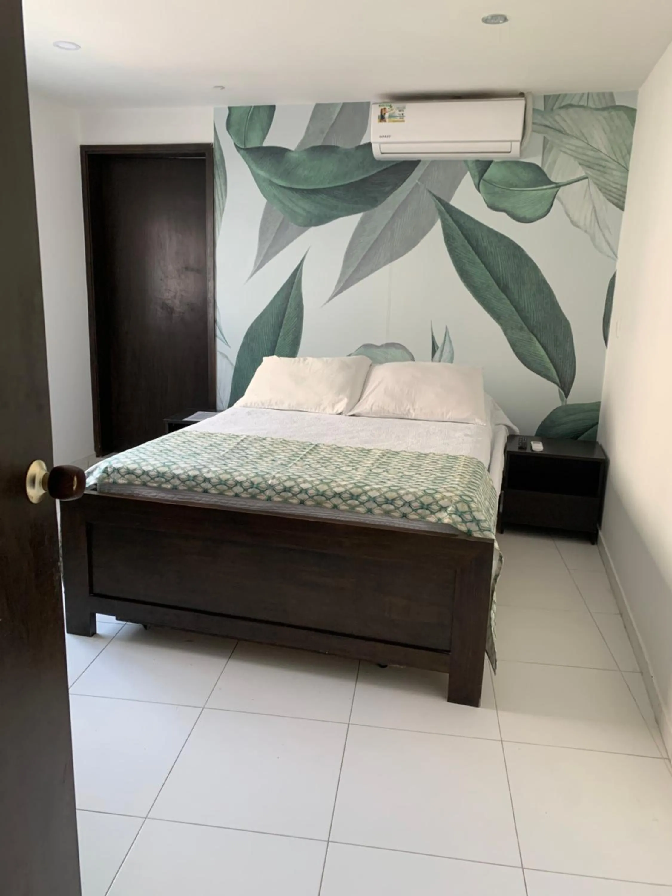Bed in Tropical Breeze Apartamentos