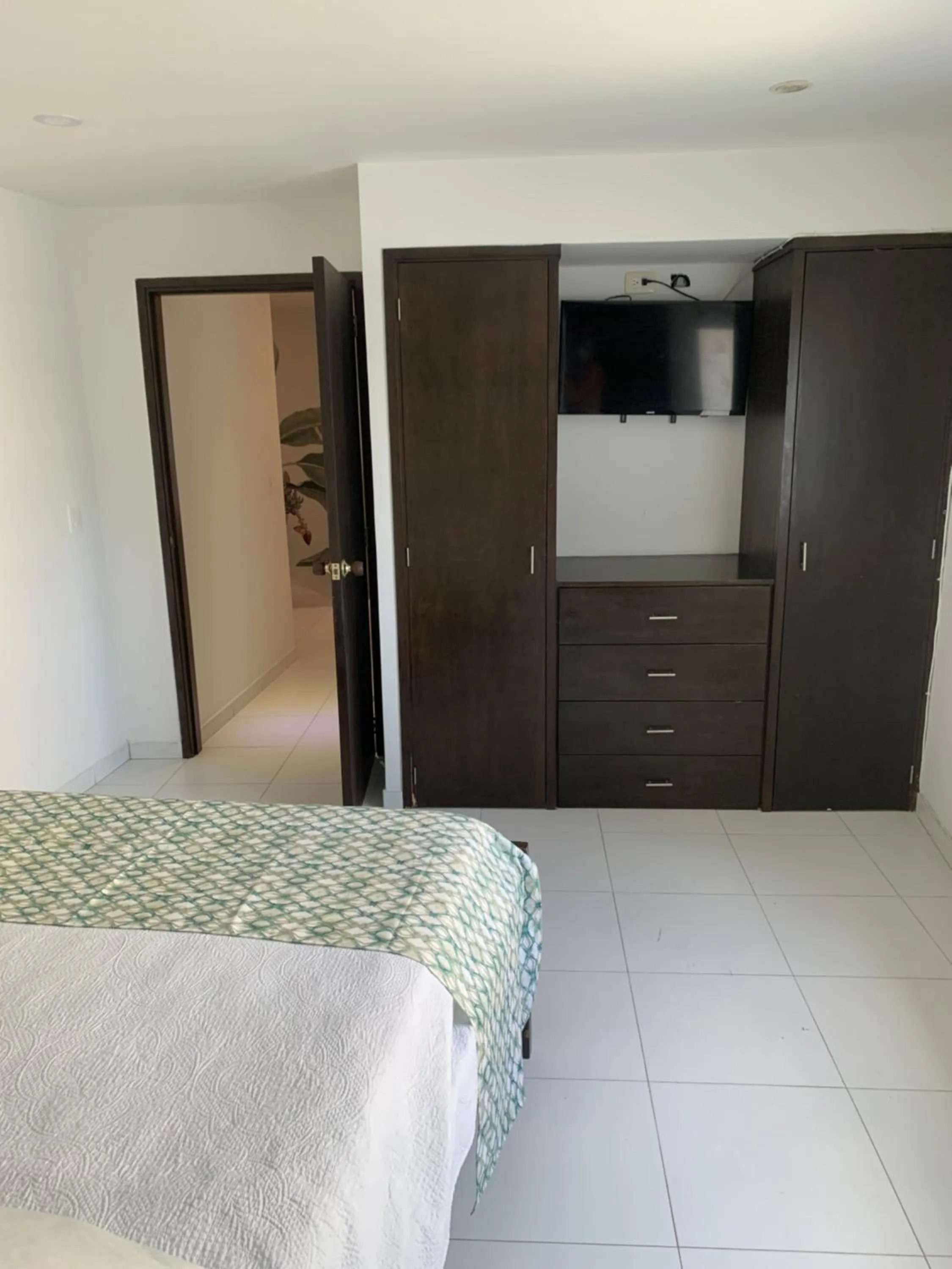Bed in Tropical Breeze Apartamentos