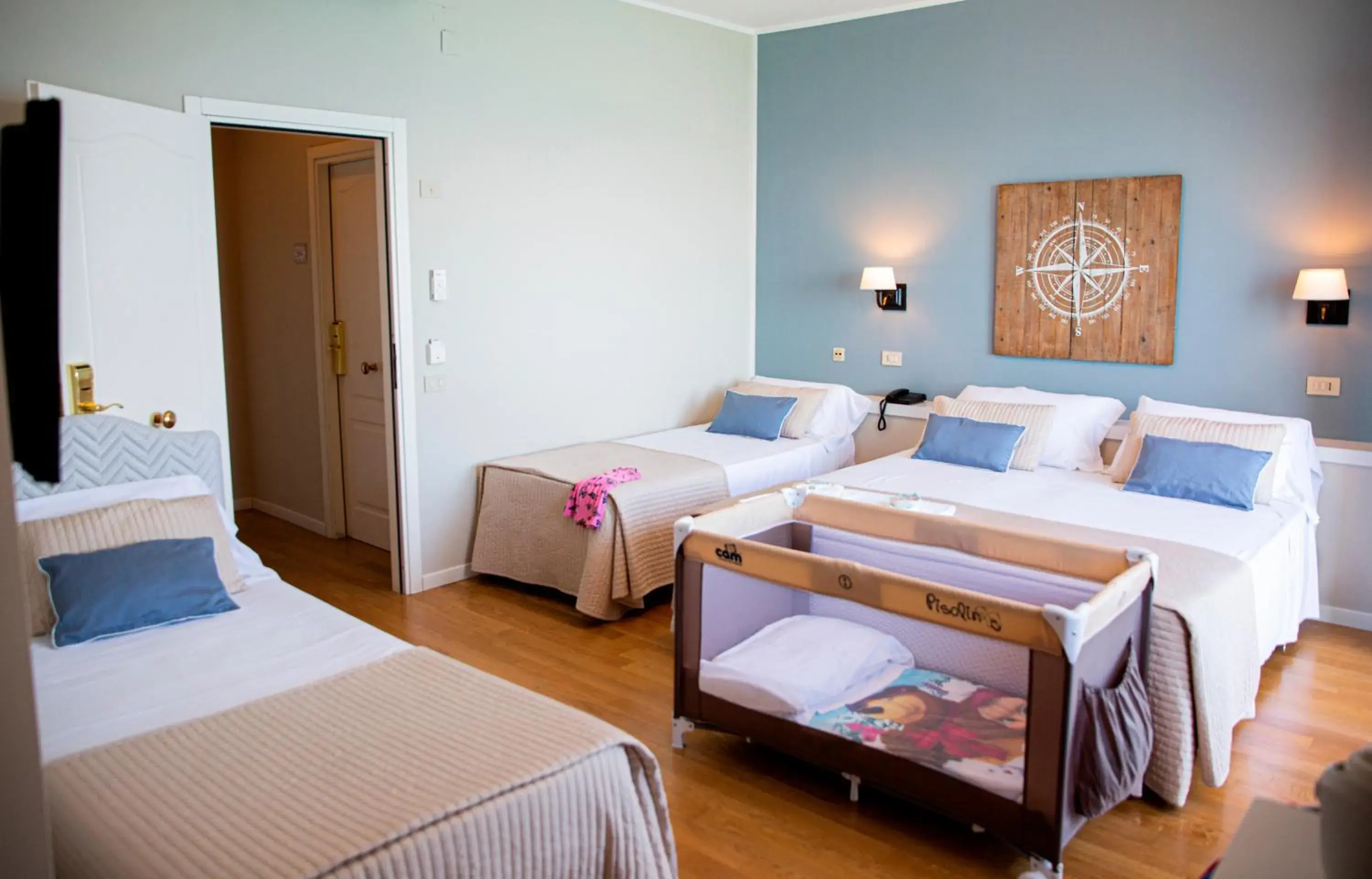 Photo of the whole room, Bed in Hotel Punta Nord Est Photo of the whole room, Bed in Hotel Punta Nord Est