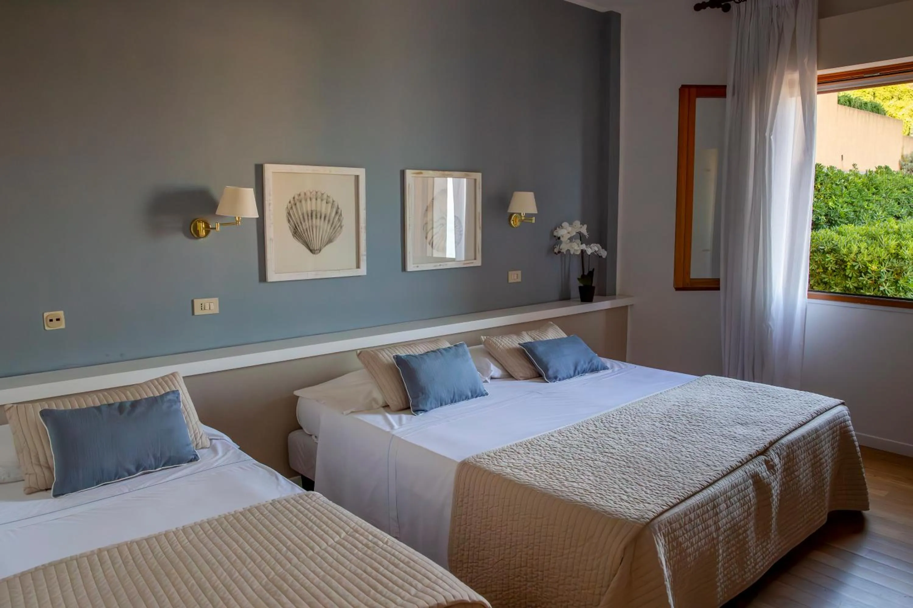 Bed in Hotel Punta Nord Est