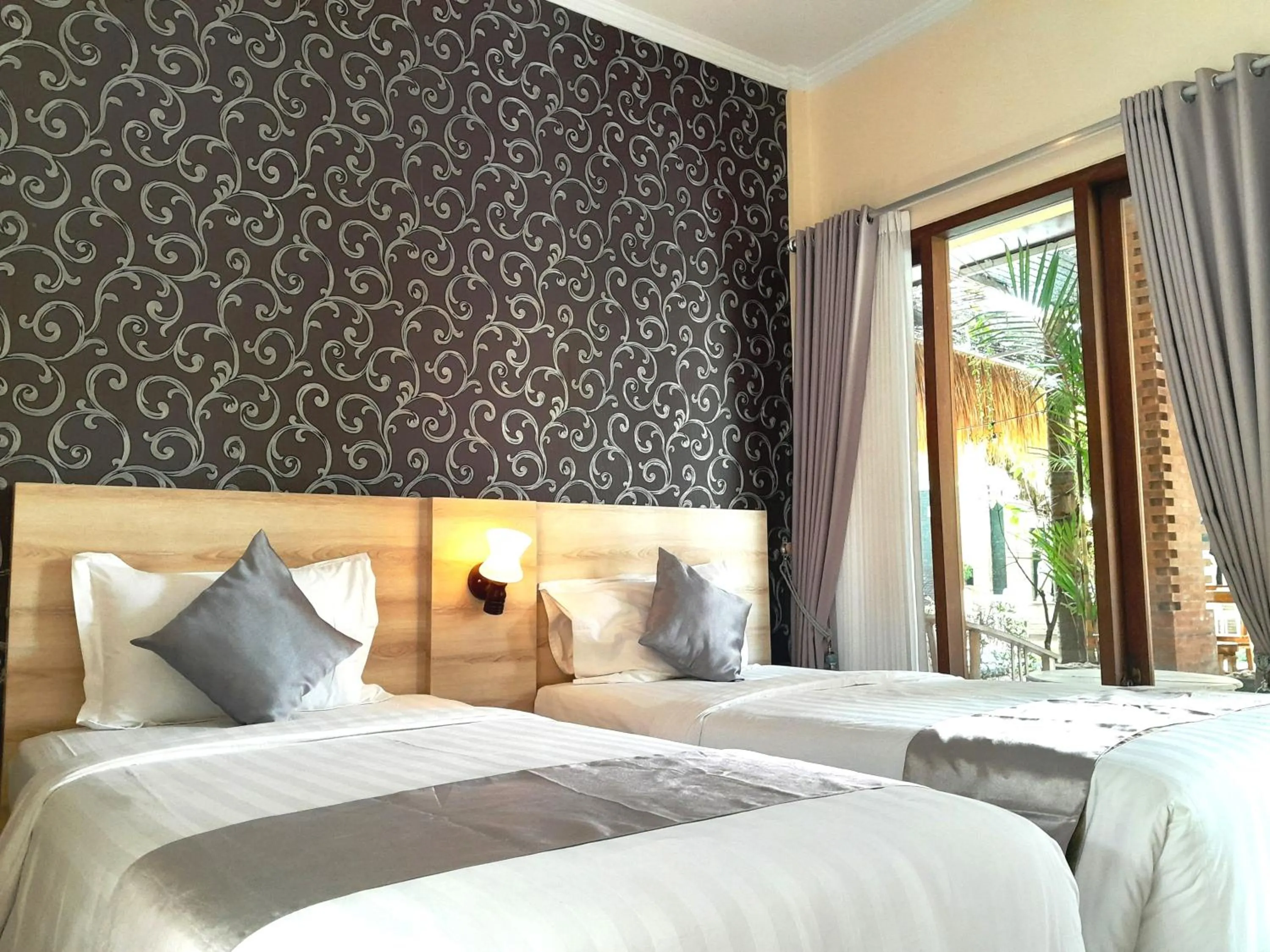Bed in North Wing Canggu Resort