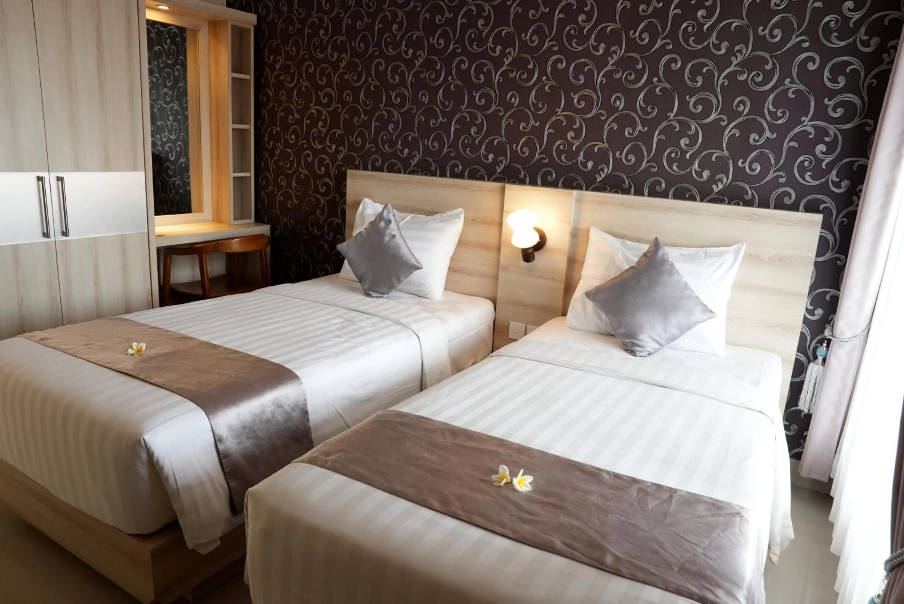 Bed in North Wing Canggu Resort