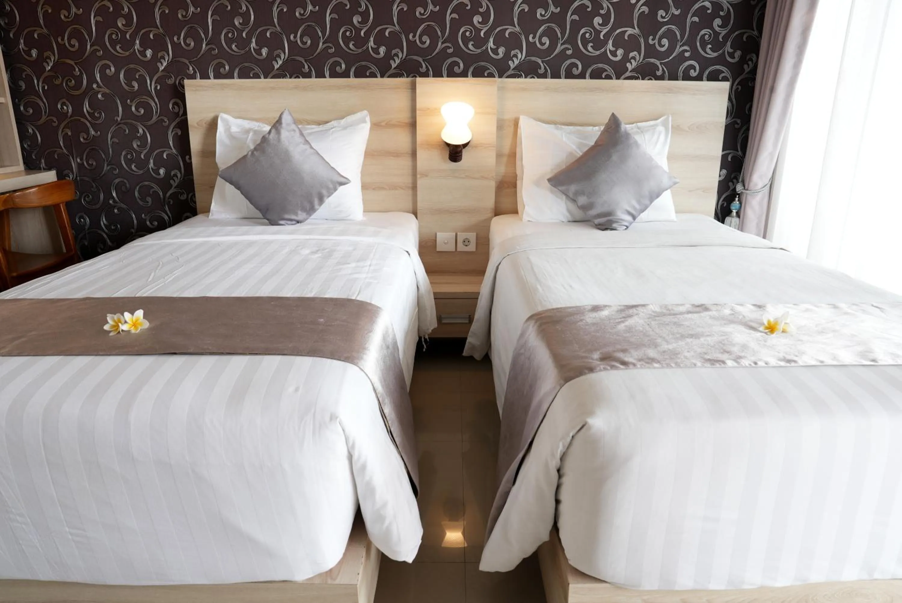 Bed in North Wing Canggu Resort