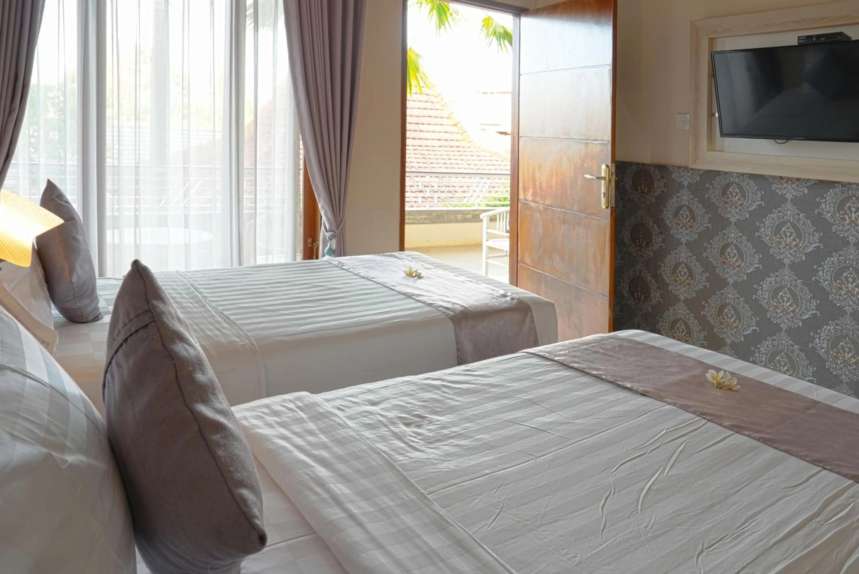 Bed in North Wing Canggu Resort