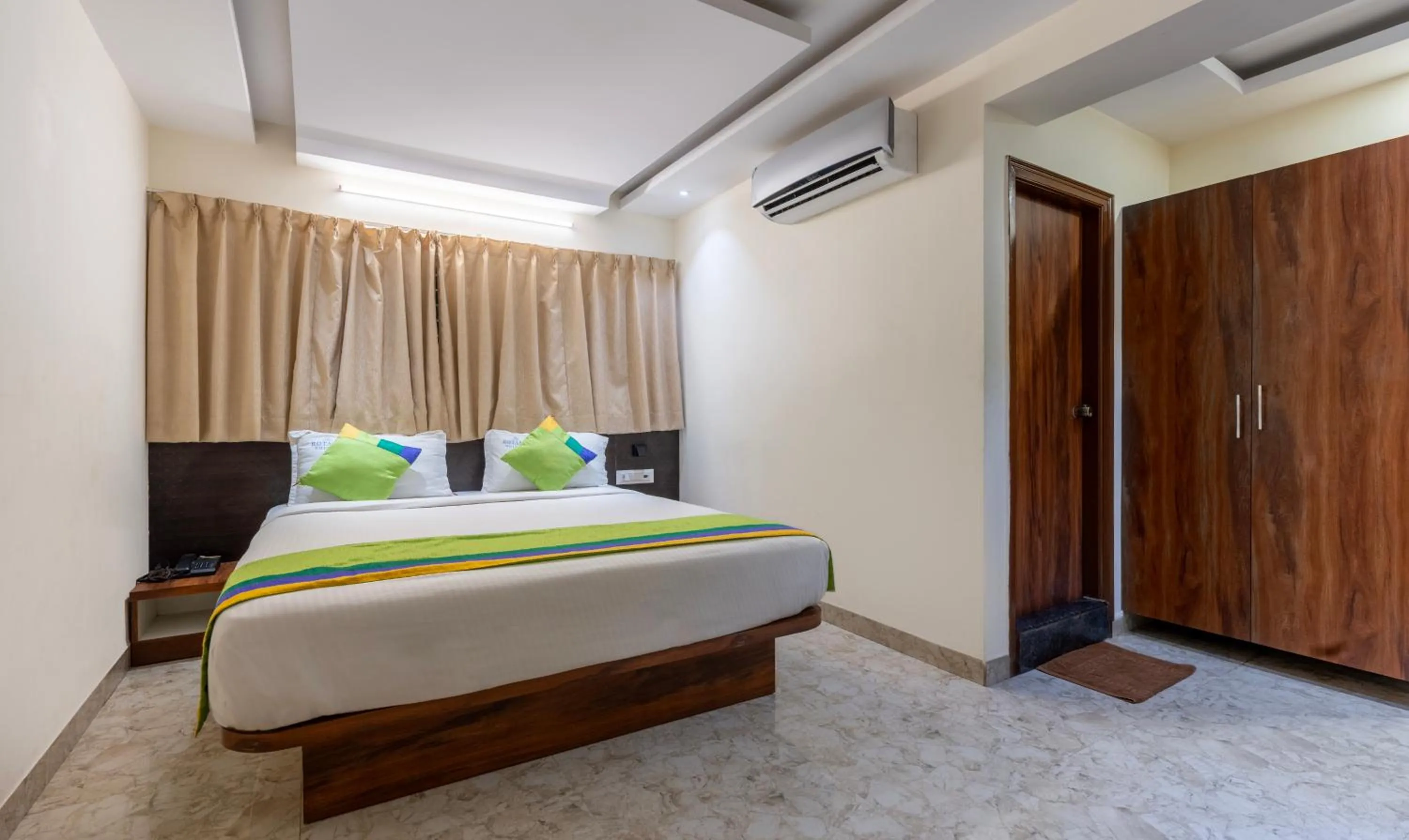 Bedroom, Bed in Treebo Sai Fortune Gateway