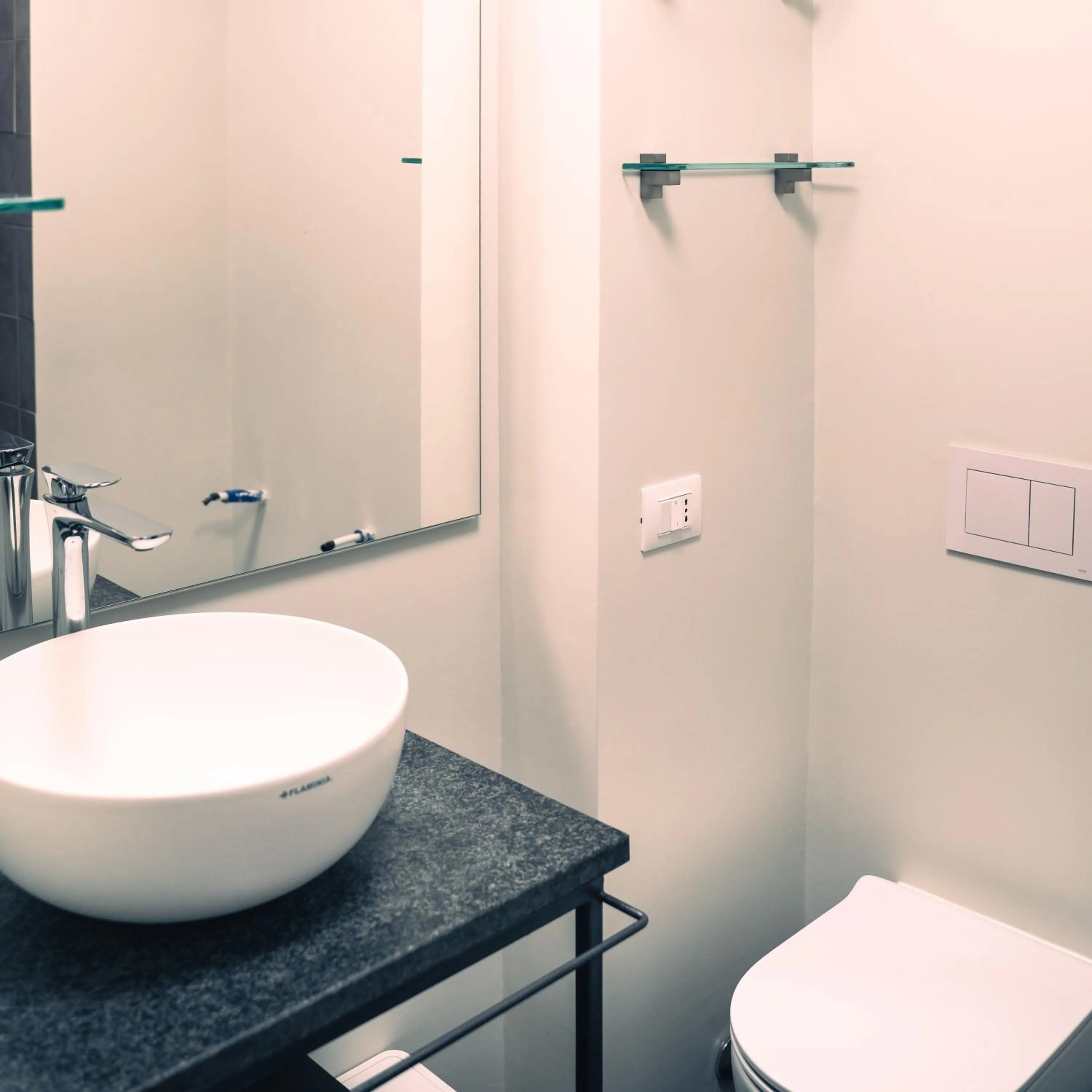 Bathroom in Capo 10 Liberty Apartments