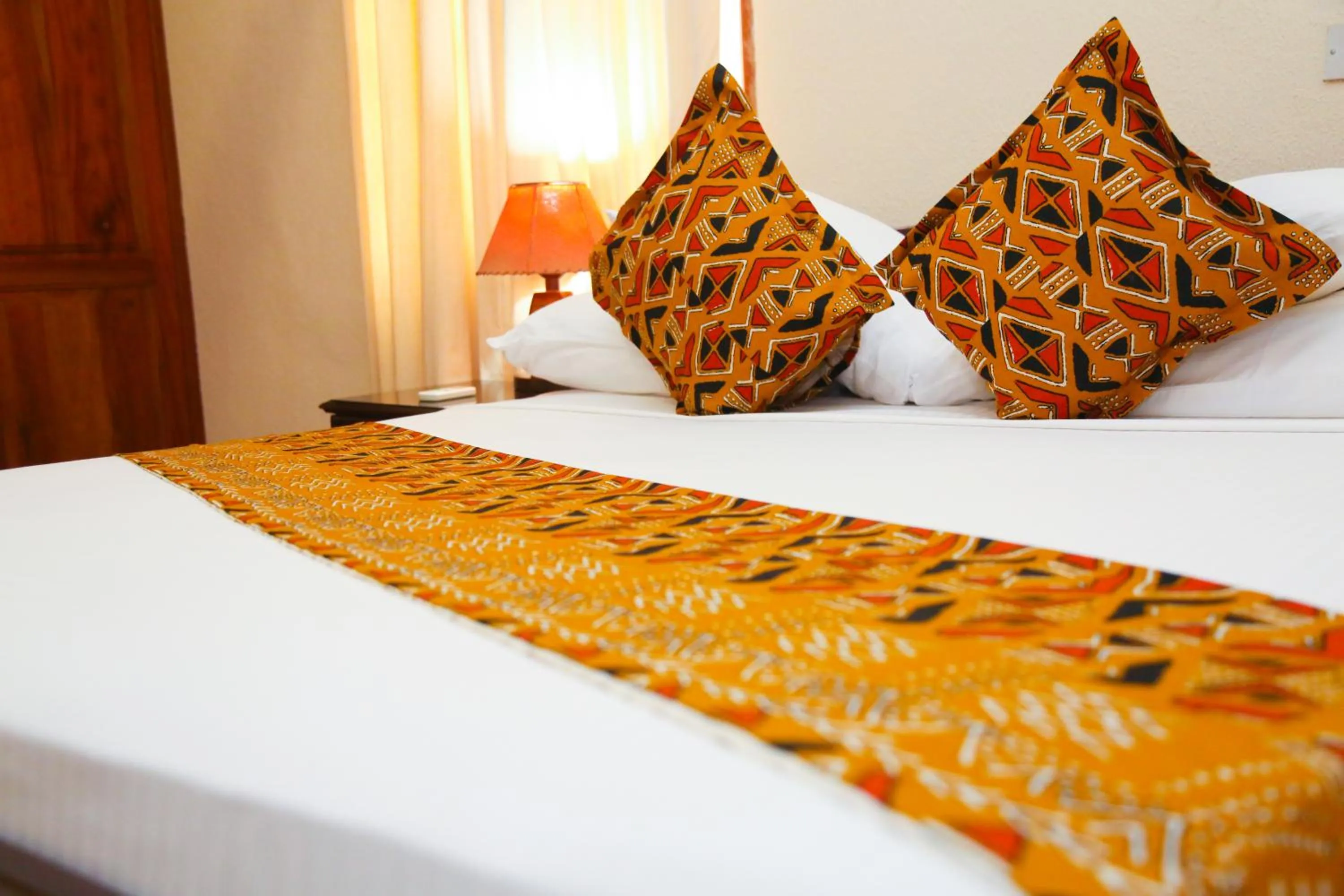 Bed in Coconut Grove Regency Hotel