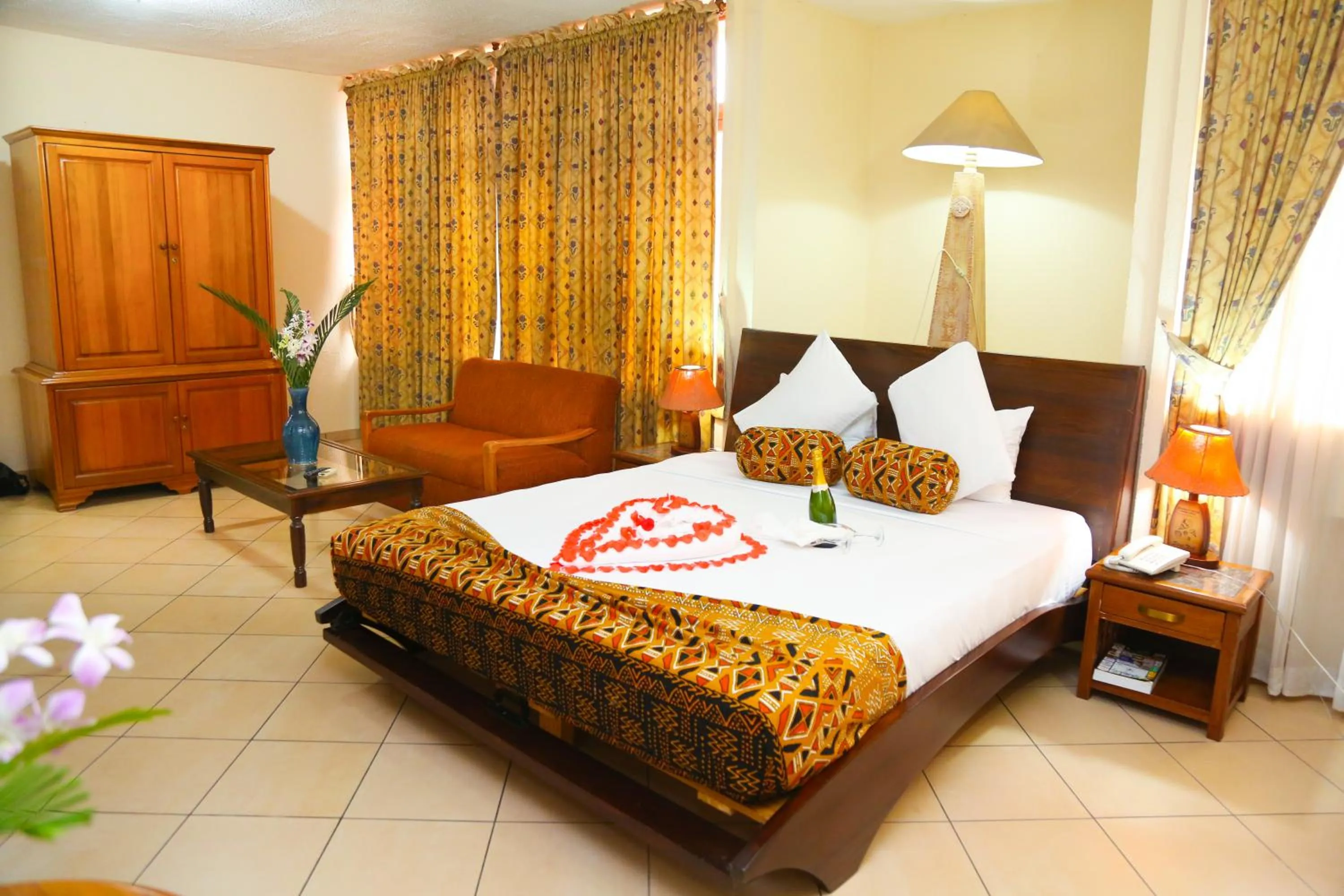 Bed in Coconut Grove Regency Hotel