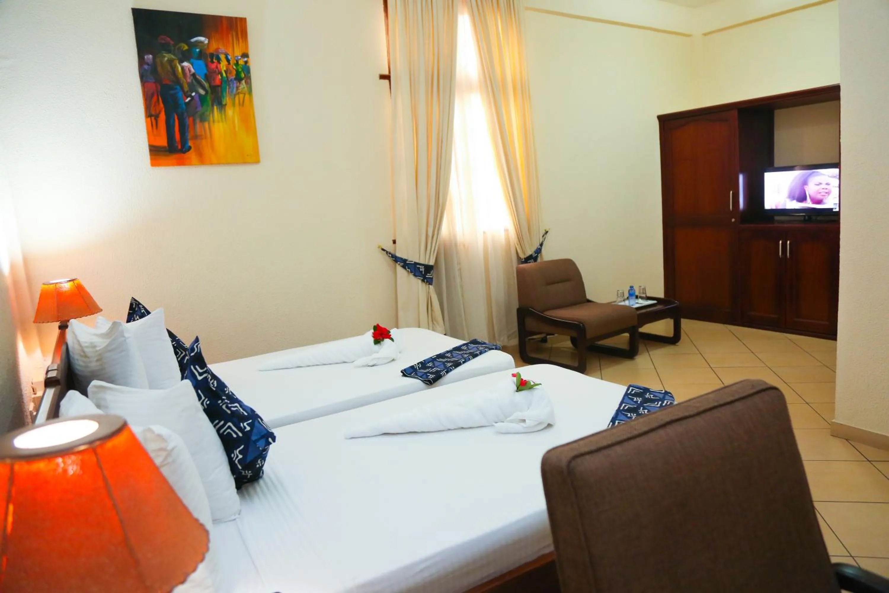 Bed in Coconut Grove Regency Hotel