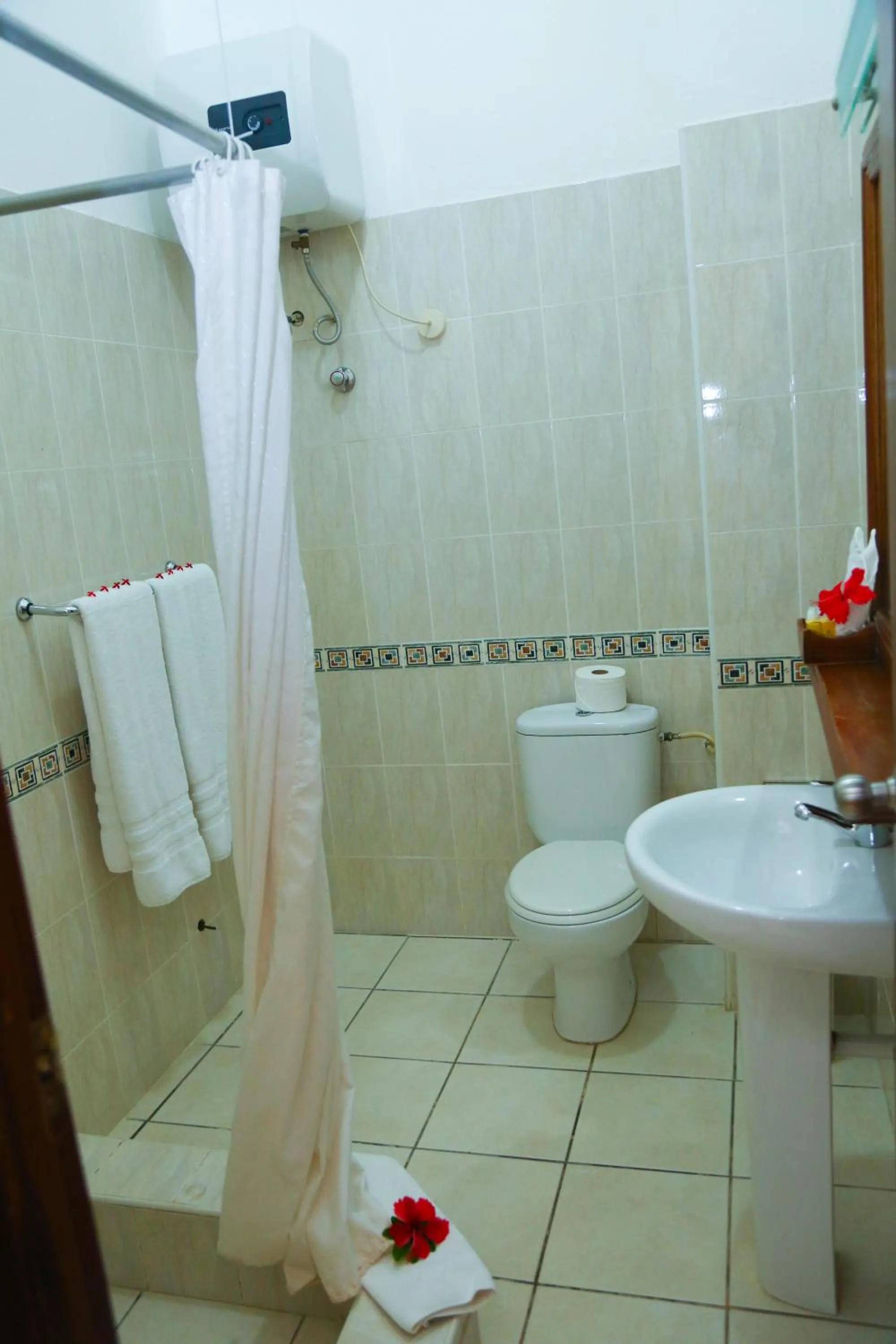 Bathroom in Coconut Grove Regency Hotel