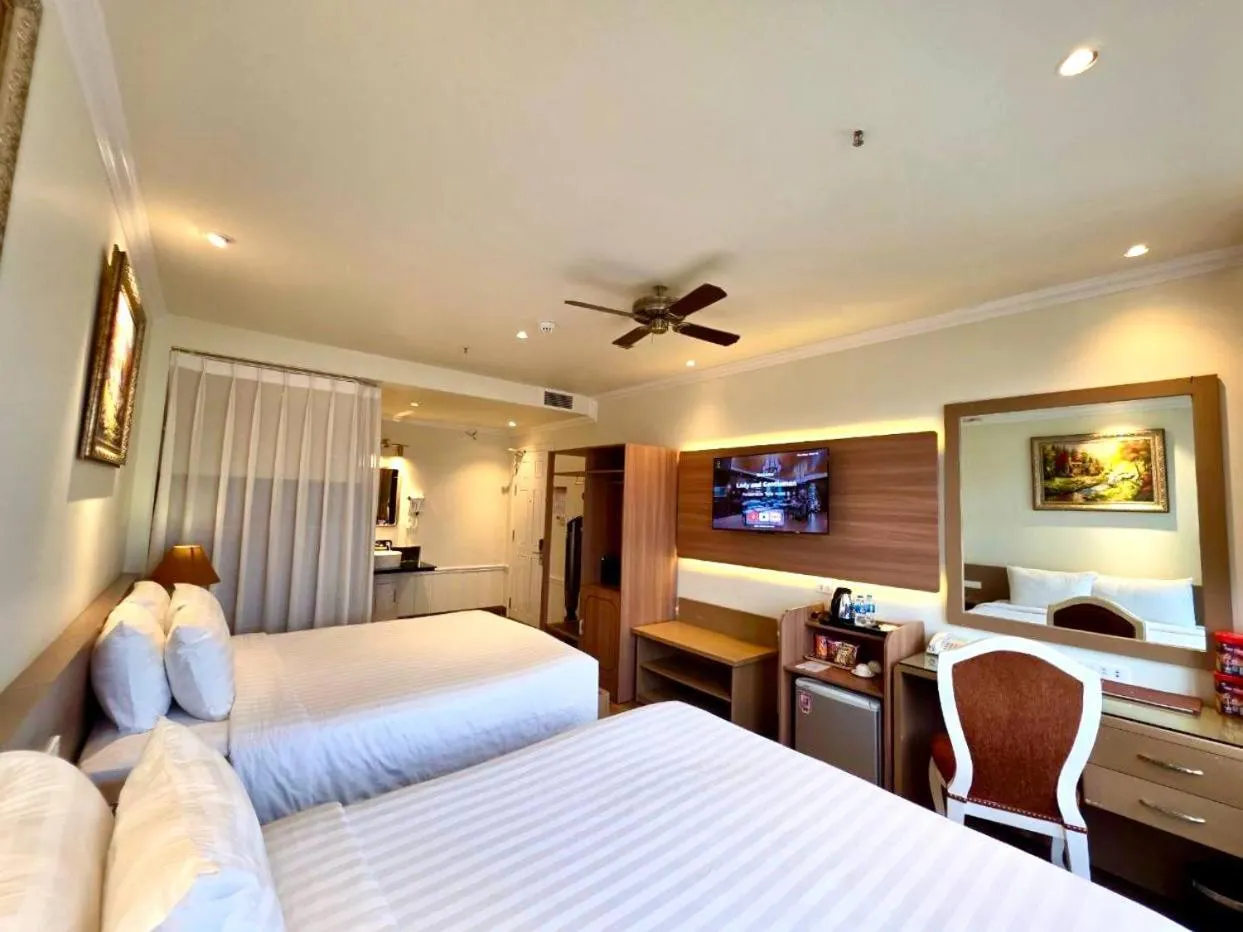 Bed in Tulip Hotel 2