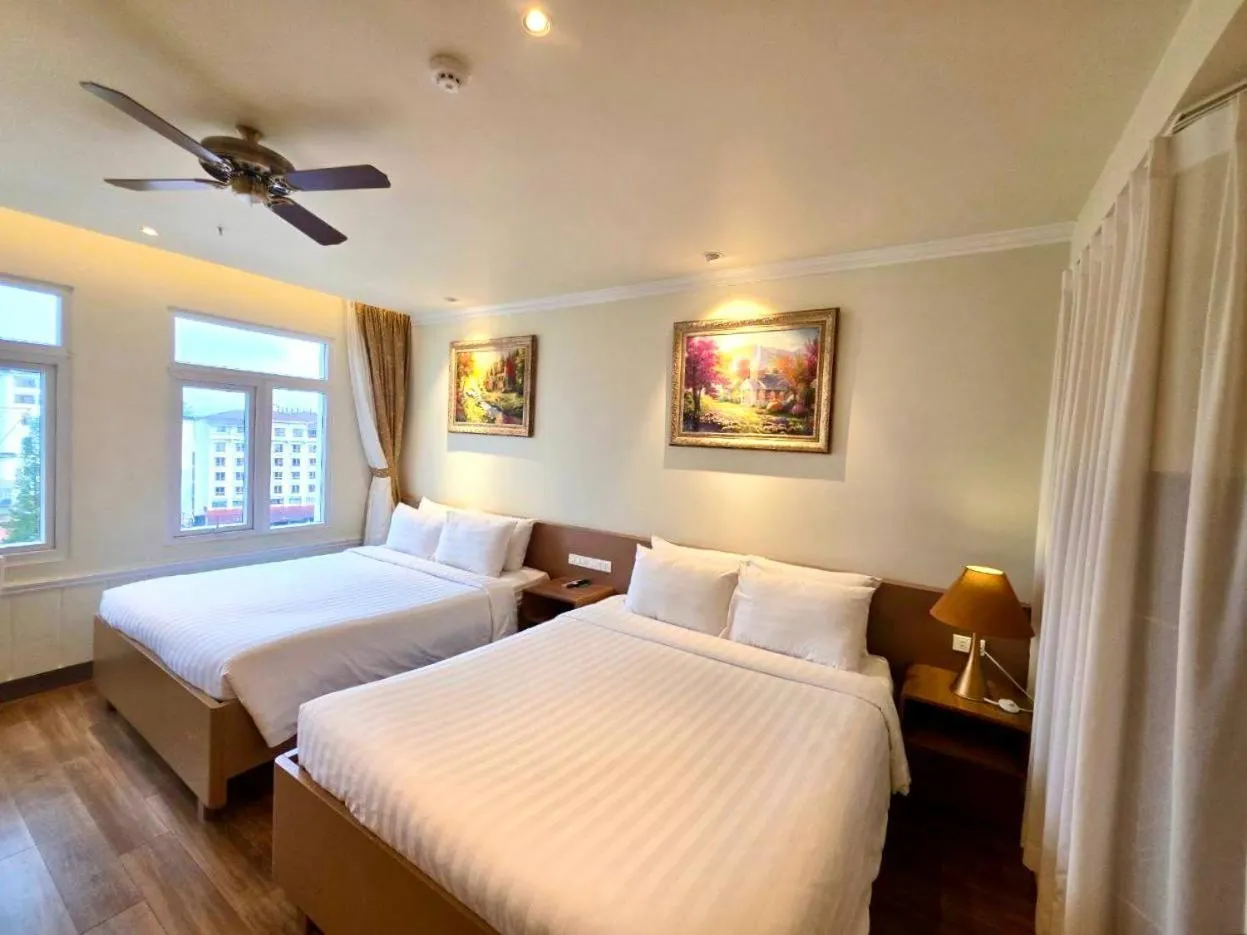 Bed in Tulip Hotel 2