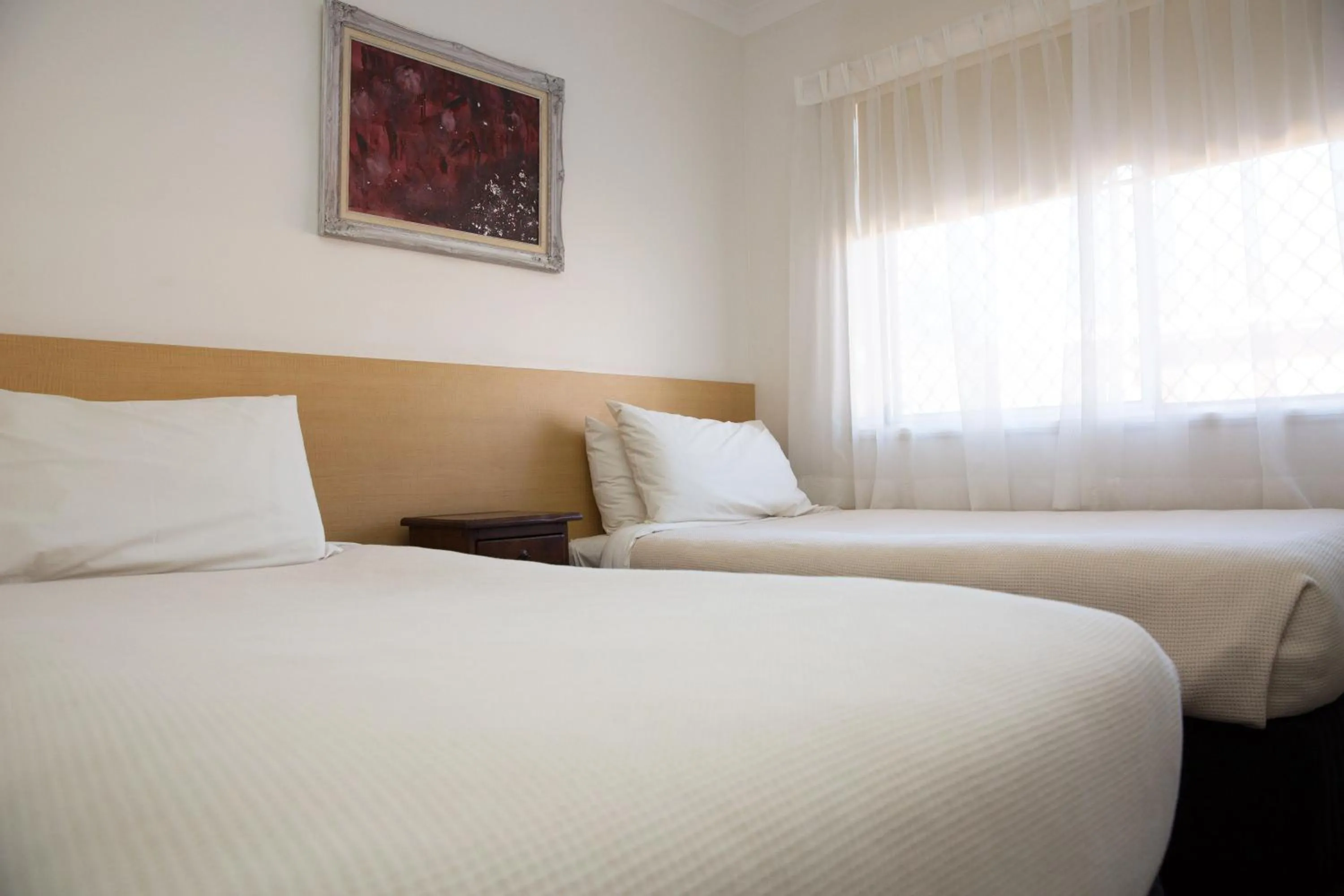 Bedroom, Bed in Centralpoint Motel