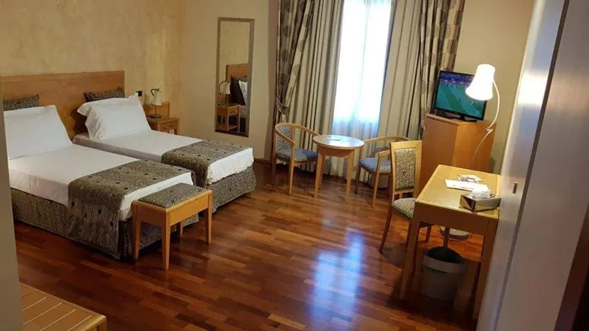 Bedroom, Bed in Riviera Hotel